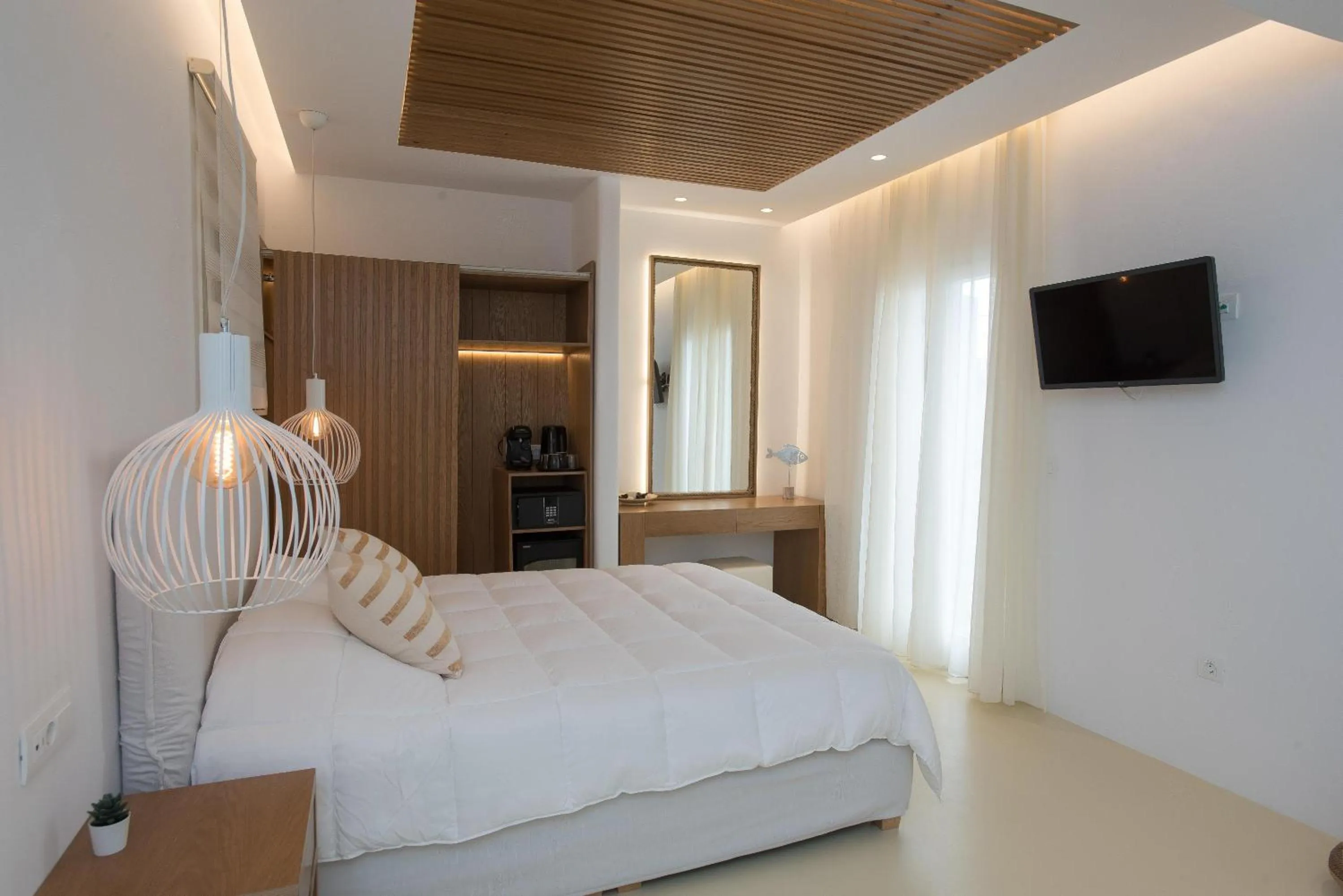 Bed in Elit Suites Mykonos