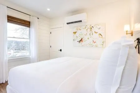 Bed in Downtown Luxury Farmhouse Apartment #4