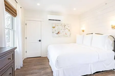 Bed in Downtown Luxury Farmhouse Apartment #4