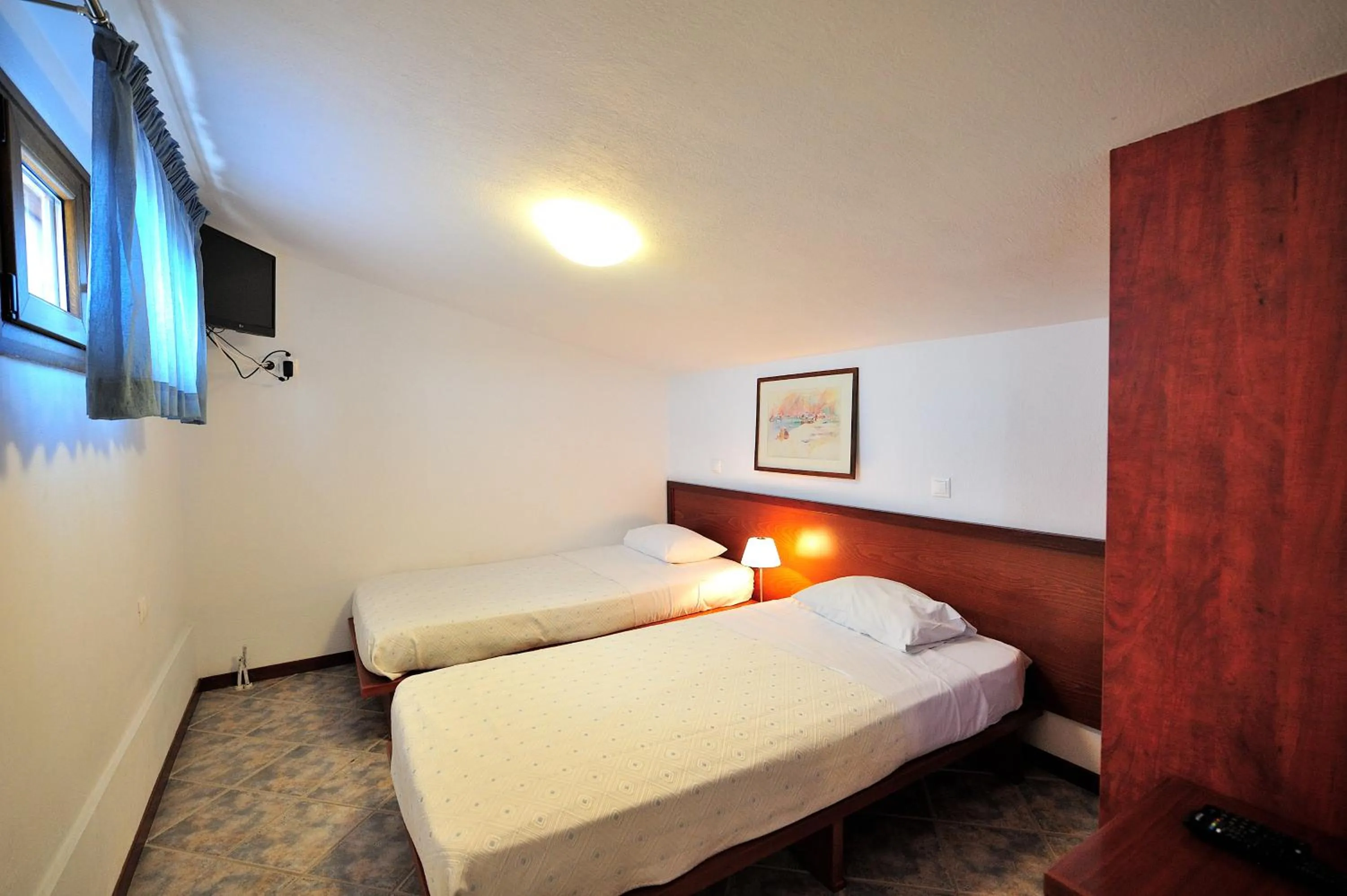 Bed in Eye Q Resort Seaview