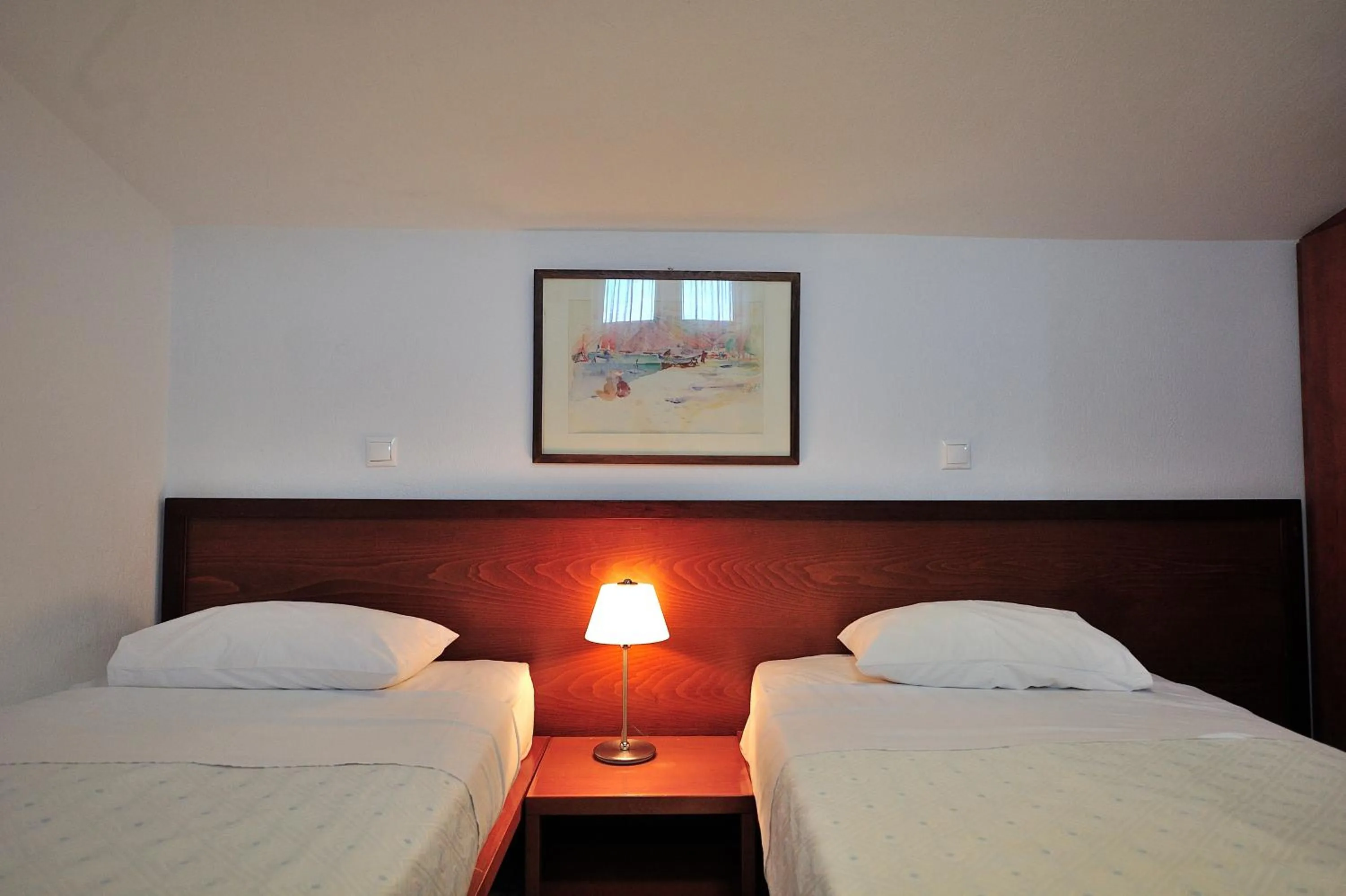 Bed in Eye Q Resort Seaview