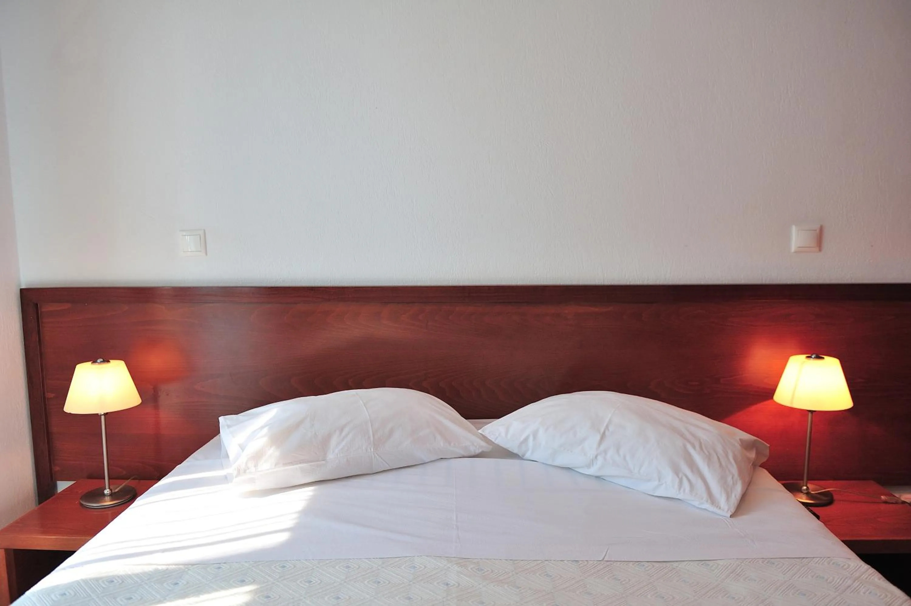 Bed in Eye Q Resort Seaview