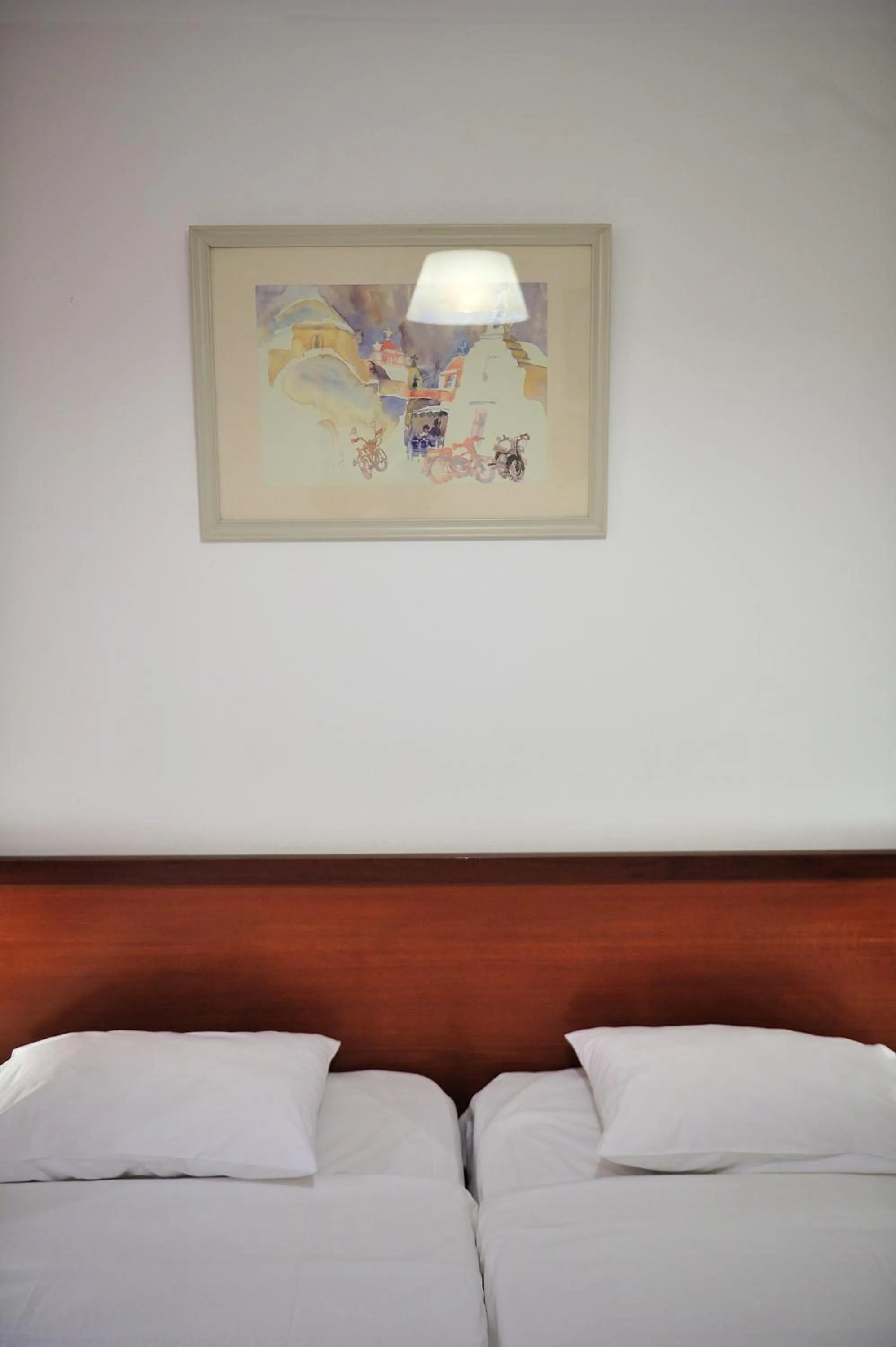 Bed in Eye Q Resort Seaview