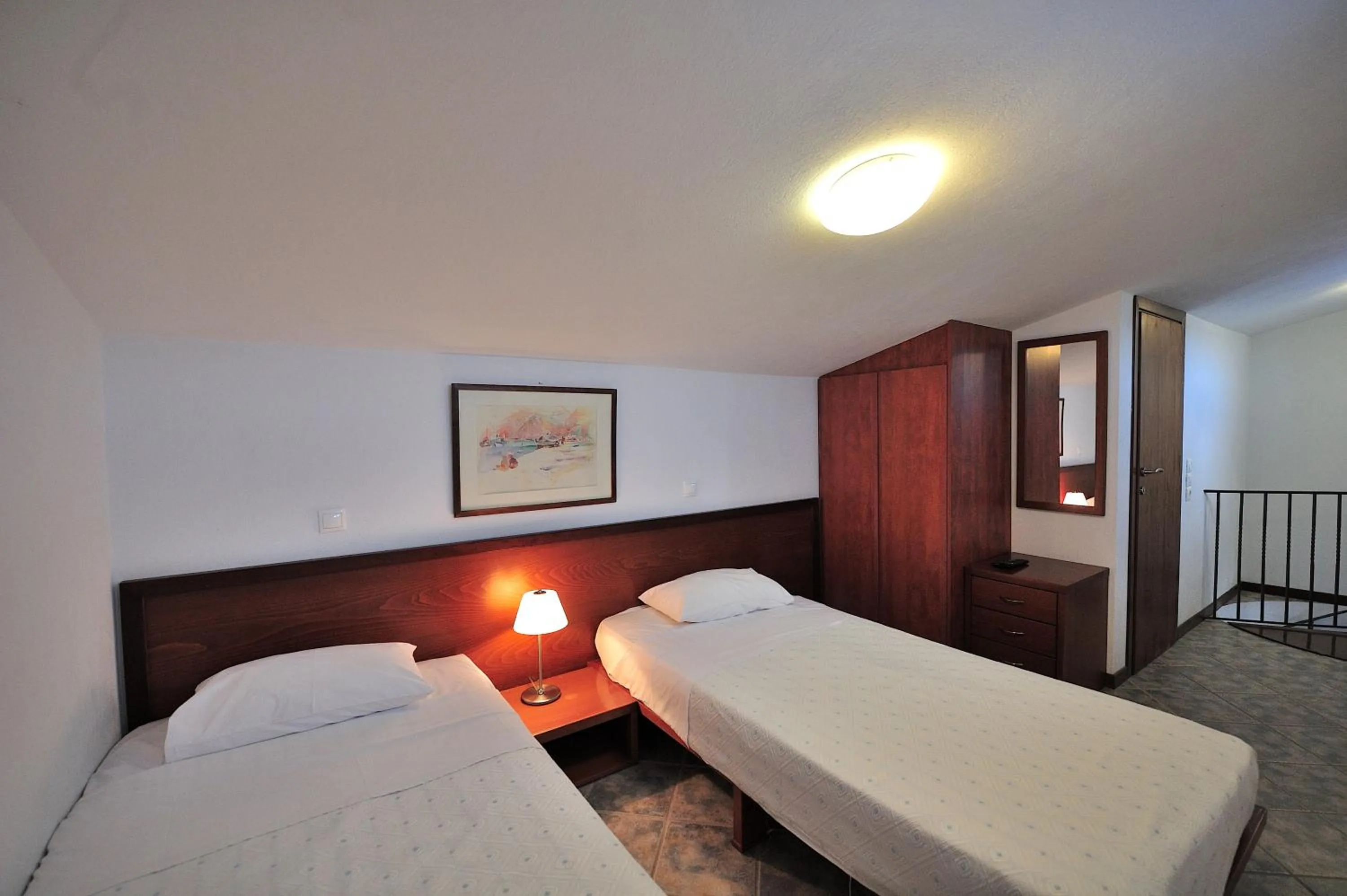 Bed in Eye Q Resort Seaview