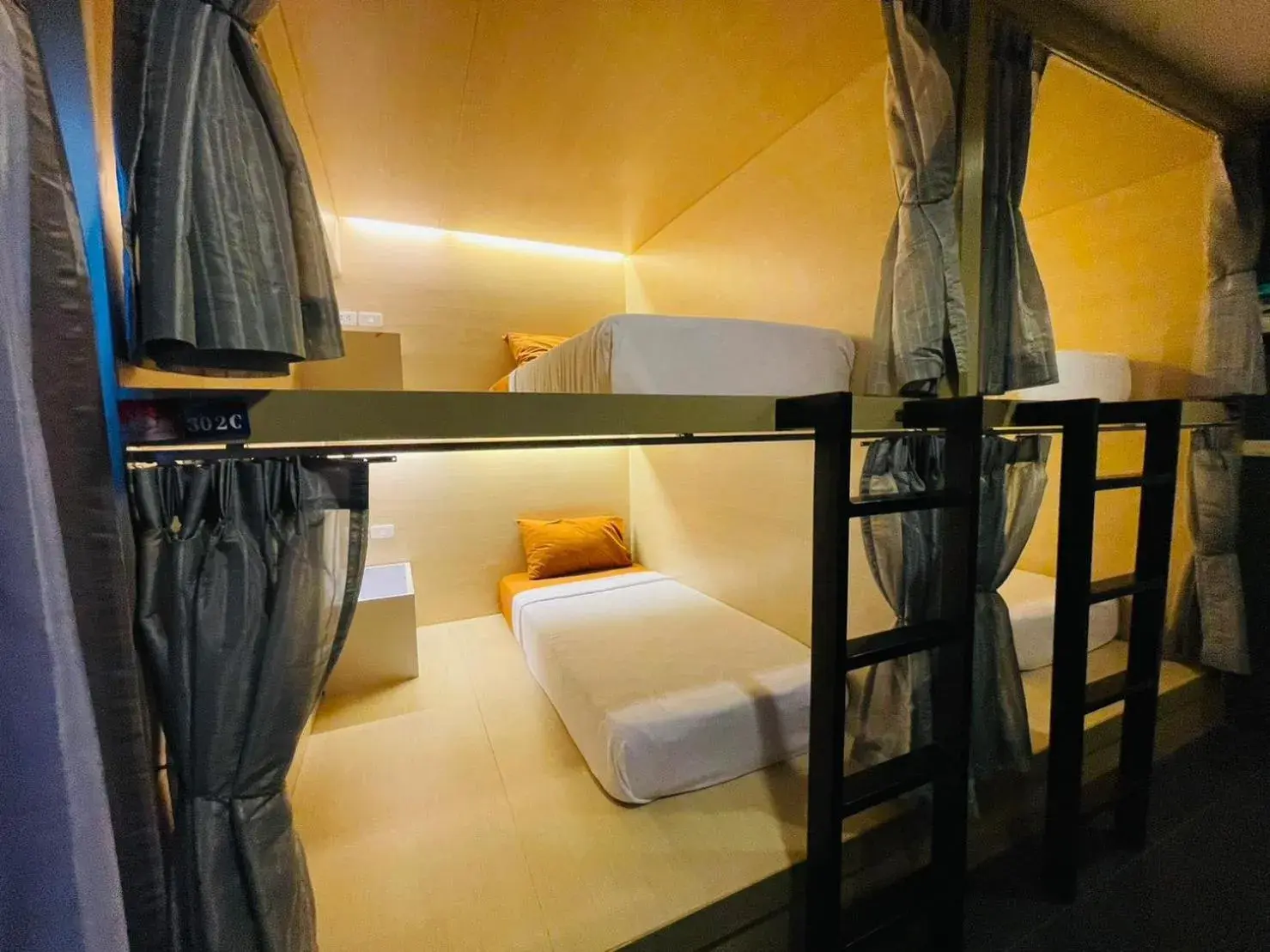 Photo of the whole room, Bed in Rabbitel Phuket Photo of the whole room, Bed in Rabbitel Phuket