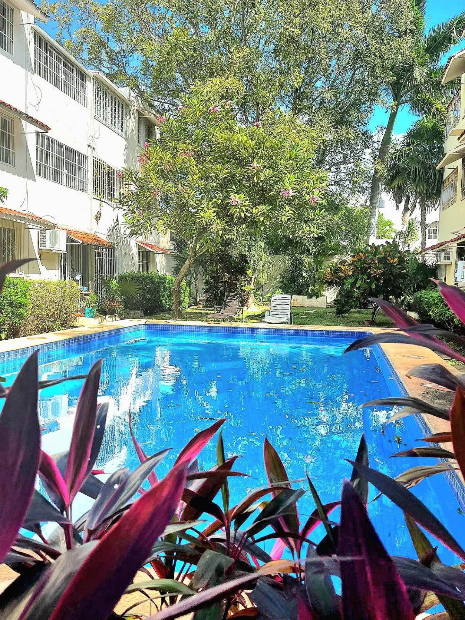 Swimming pool in Departamento Céntrico y Moderno en Cancún.