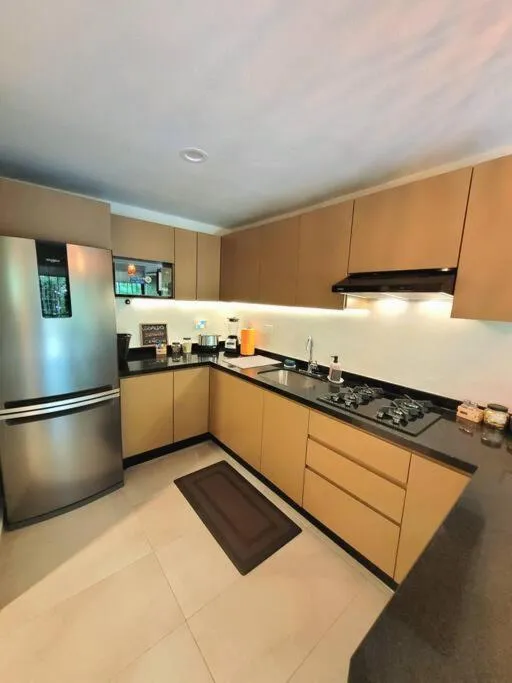 Kitchen or kitchenette in Departamento Céntrico y Moderno en Cancún.