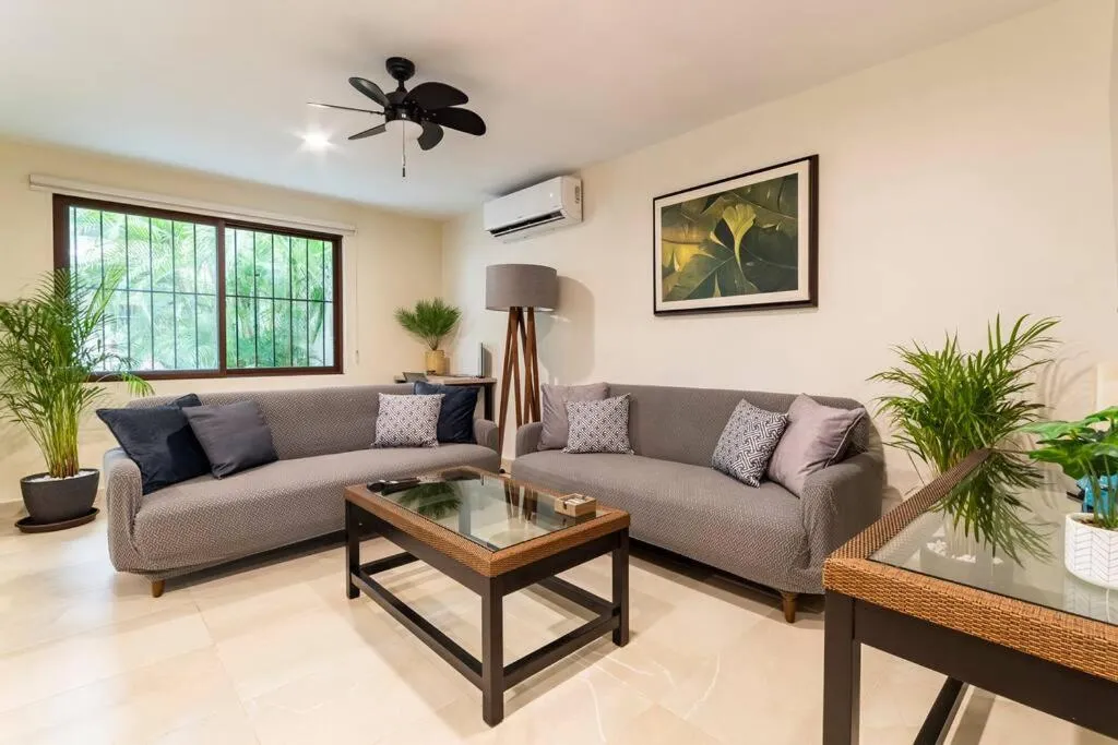 Living room in Departamento Céntrico y Moderno en Cancún.