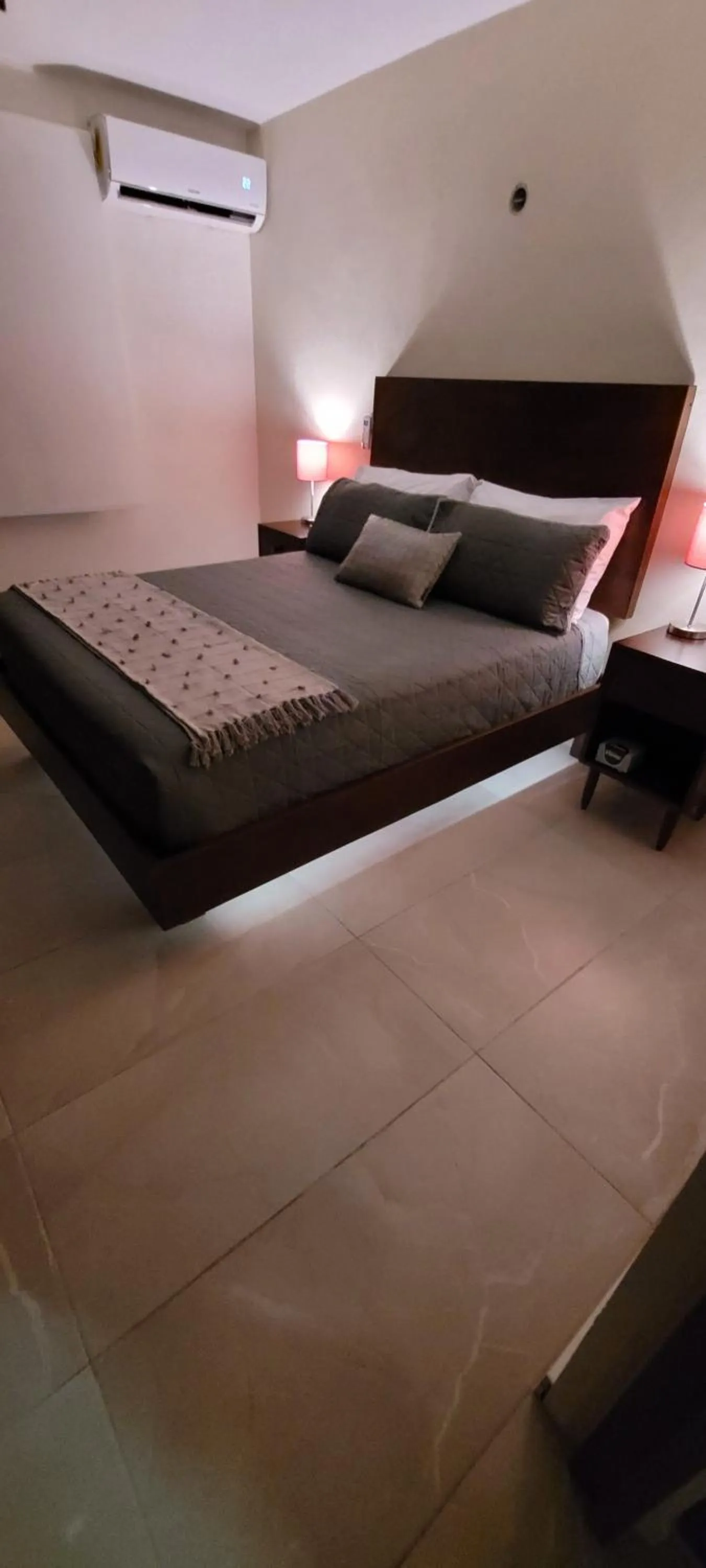 Bed in Departamento Céntrico y Moderno en Cancún.