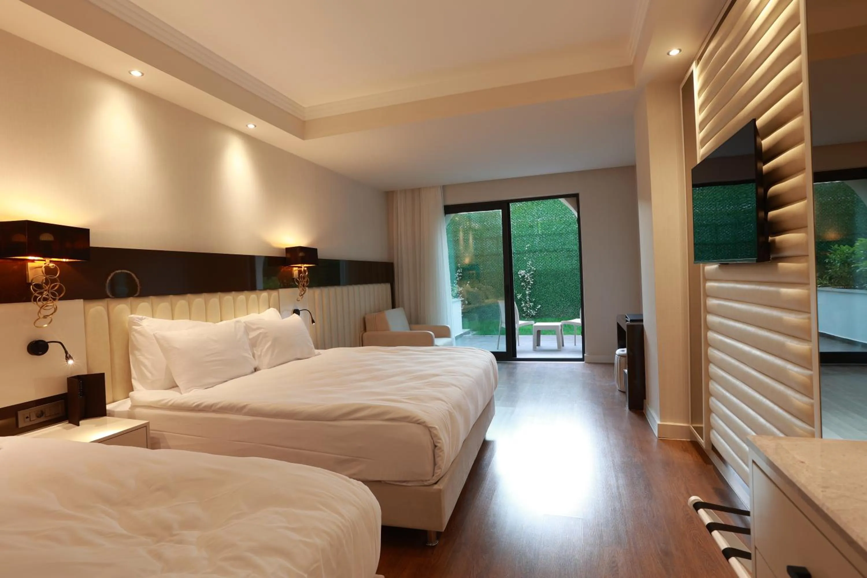 Bed in Serenity Queen Hotel