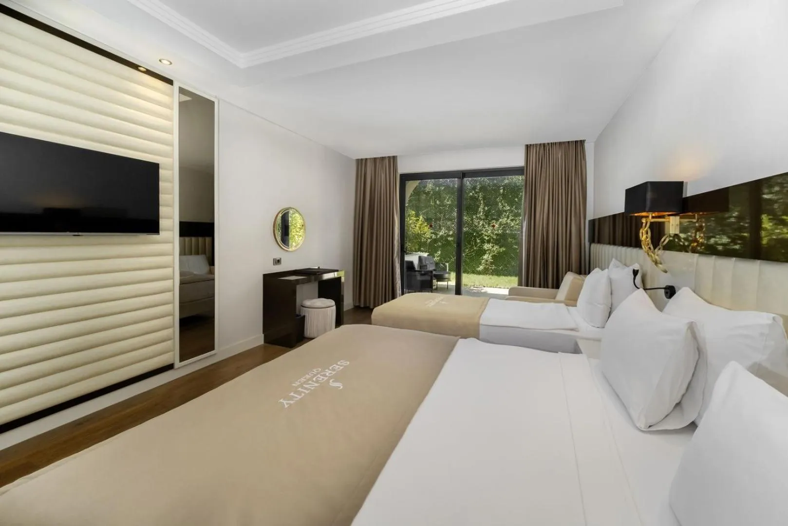 Communal lounge/ TV room in Serenity Queen Hotel