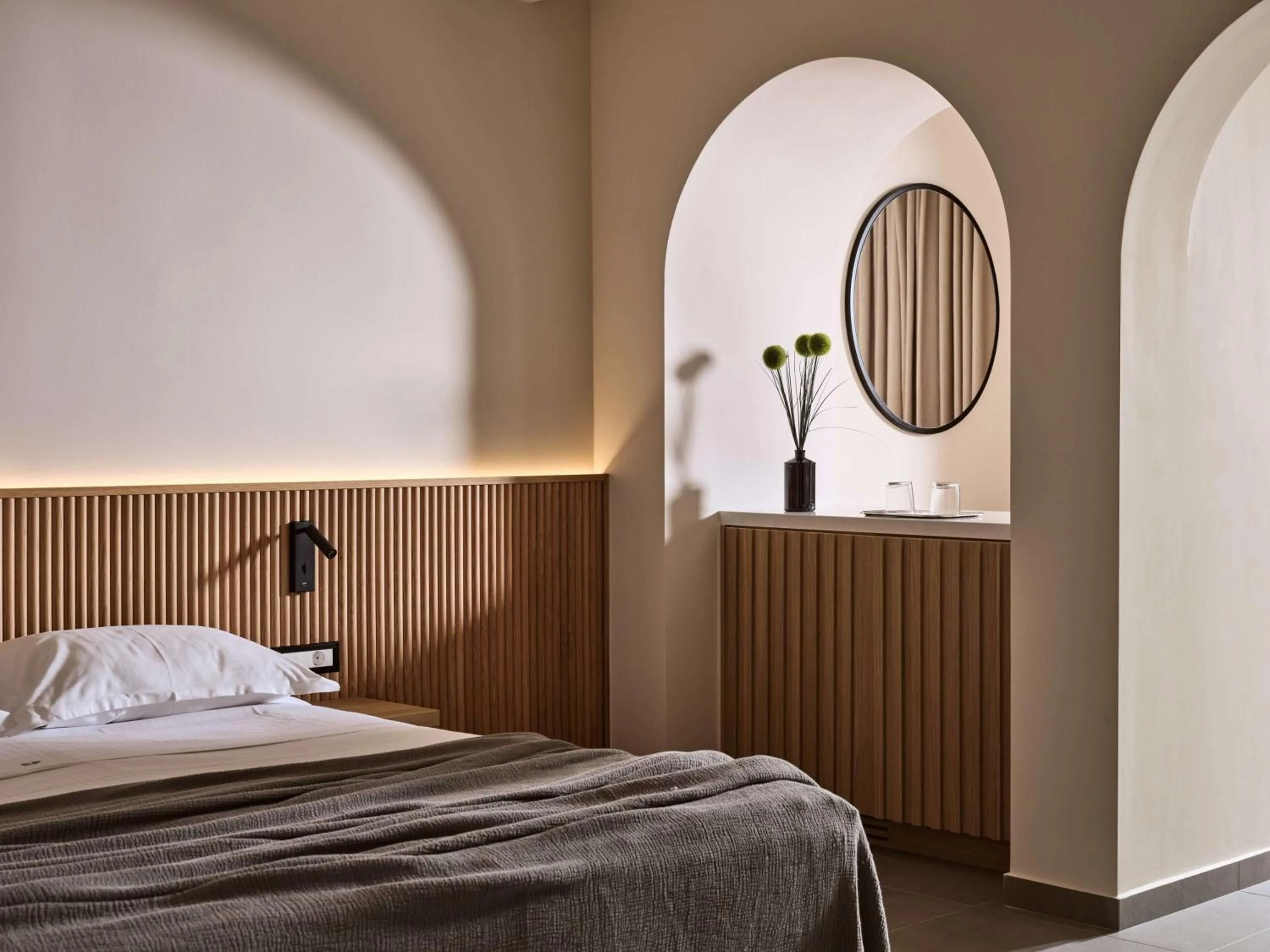 Bed in Elounda Palm Hotel & Suites