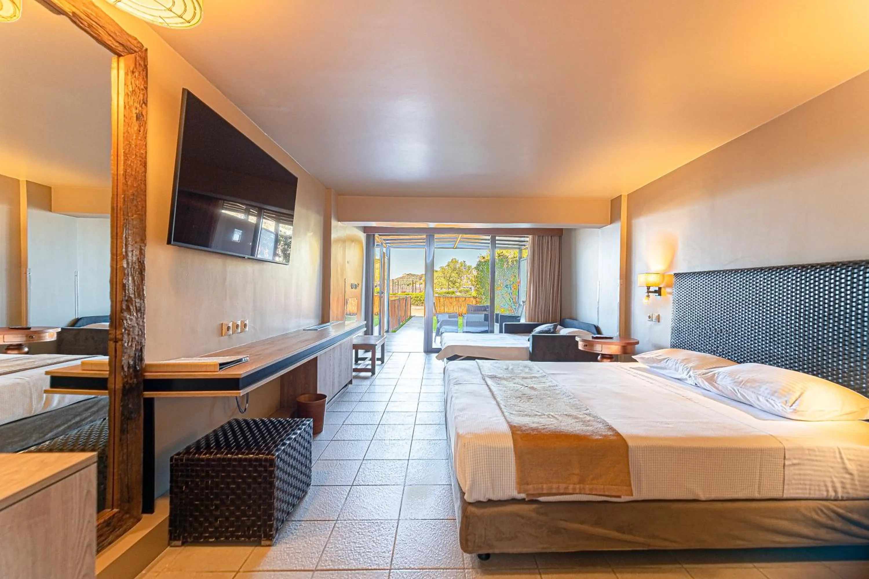 Garden view, Bed in Aegeon Beach Hotel