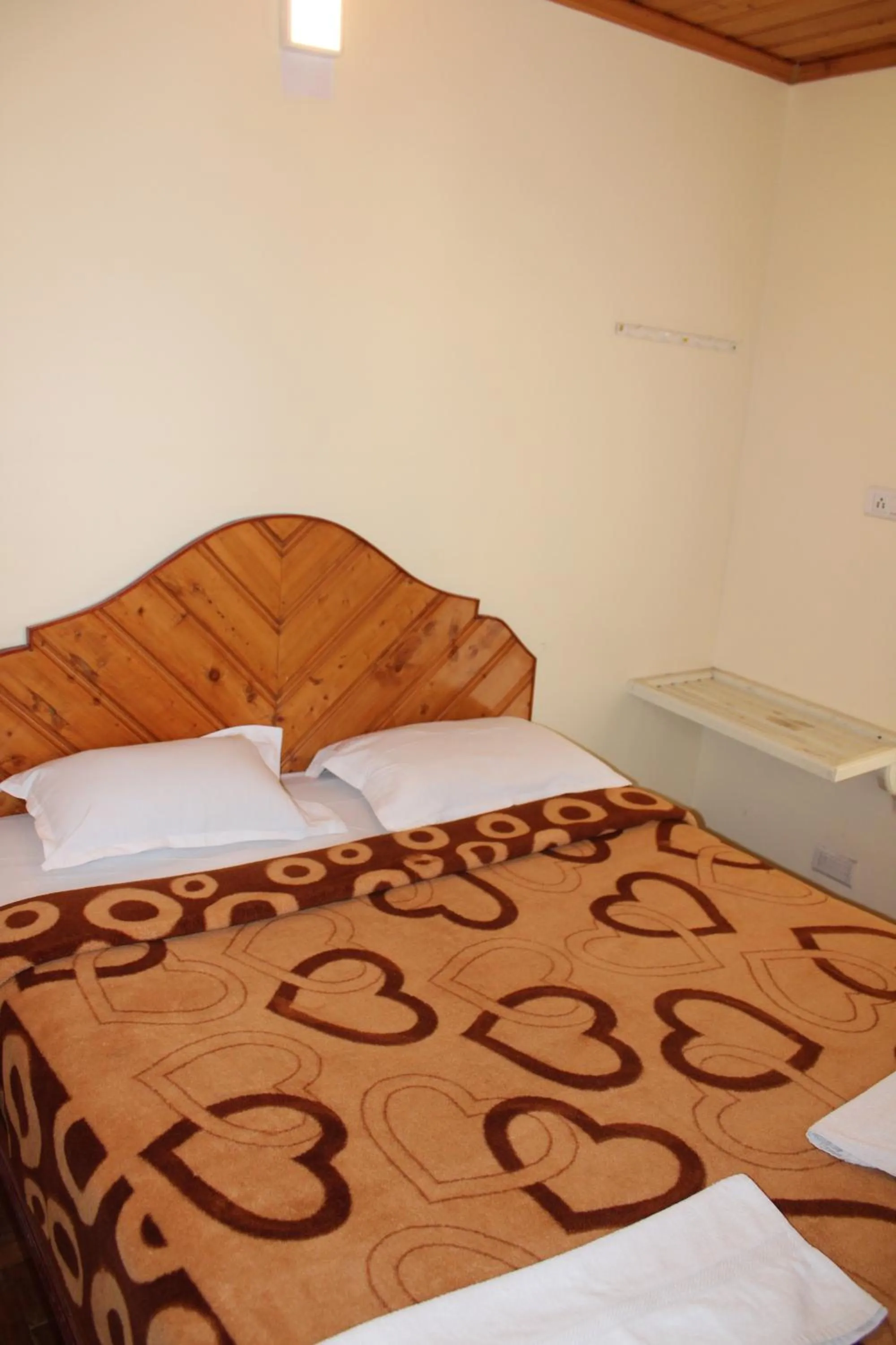 Bed in Hotel Temple Towers