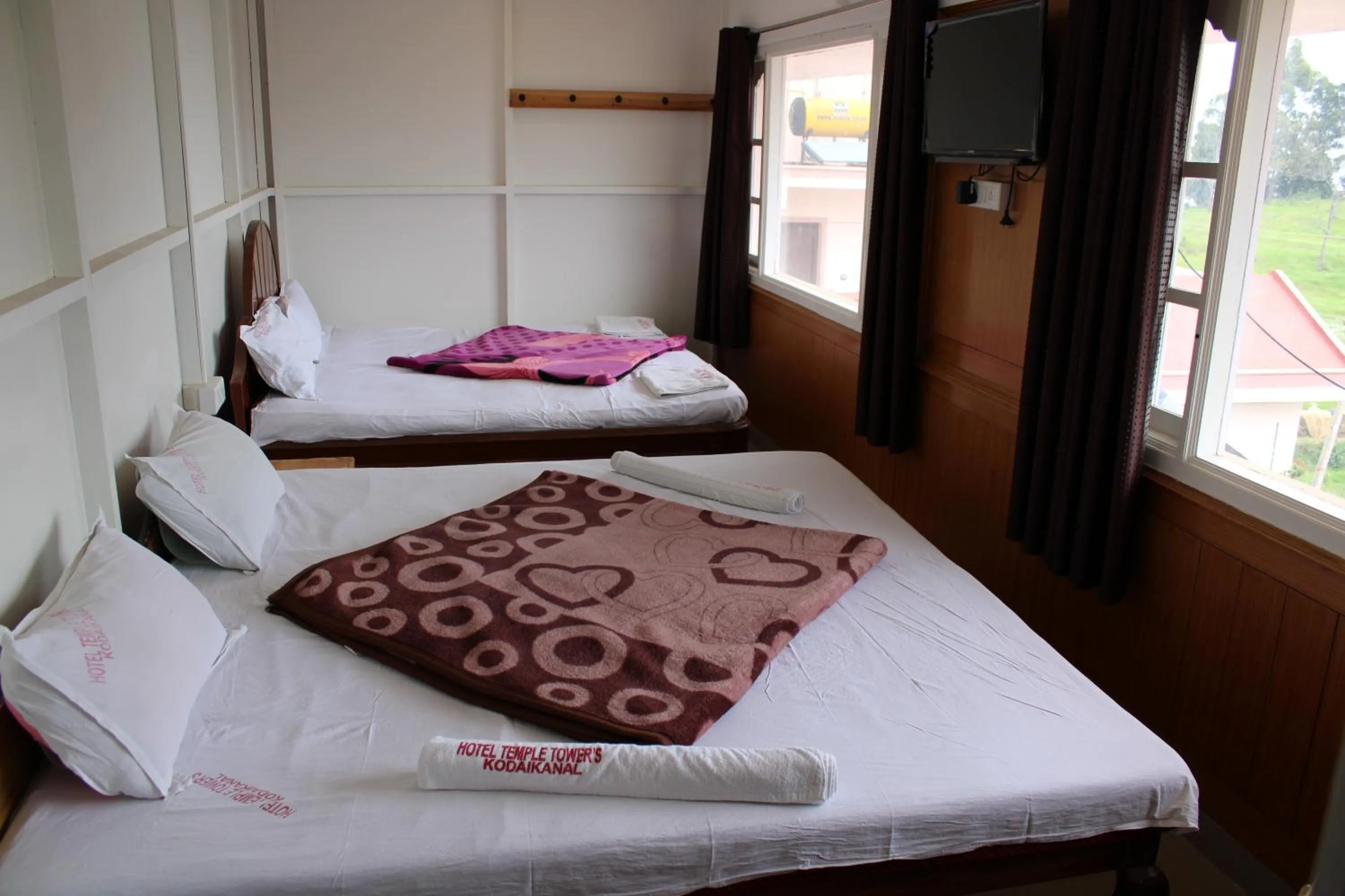 Bed in Hotel Temple Towers