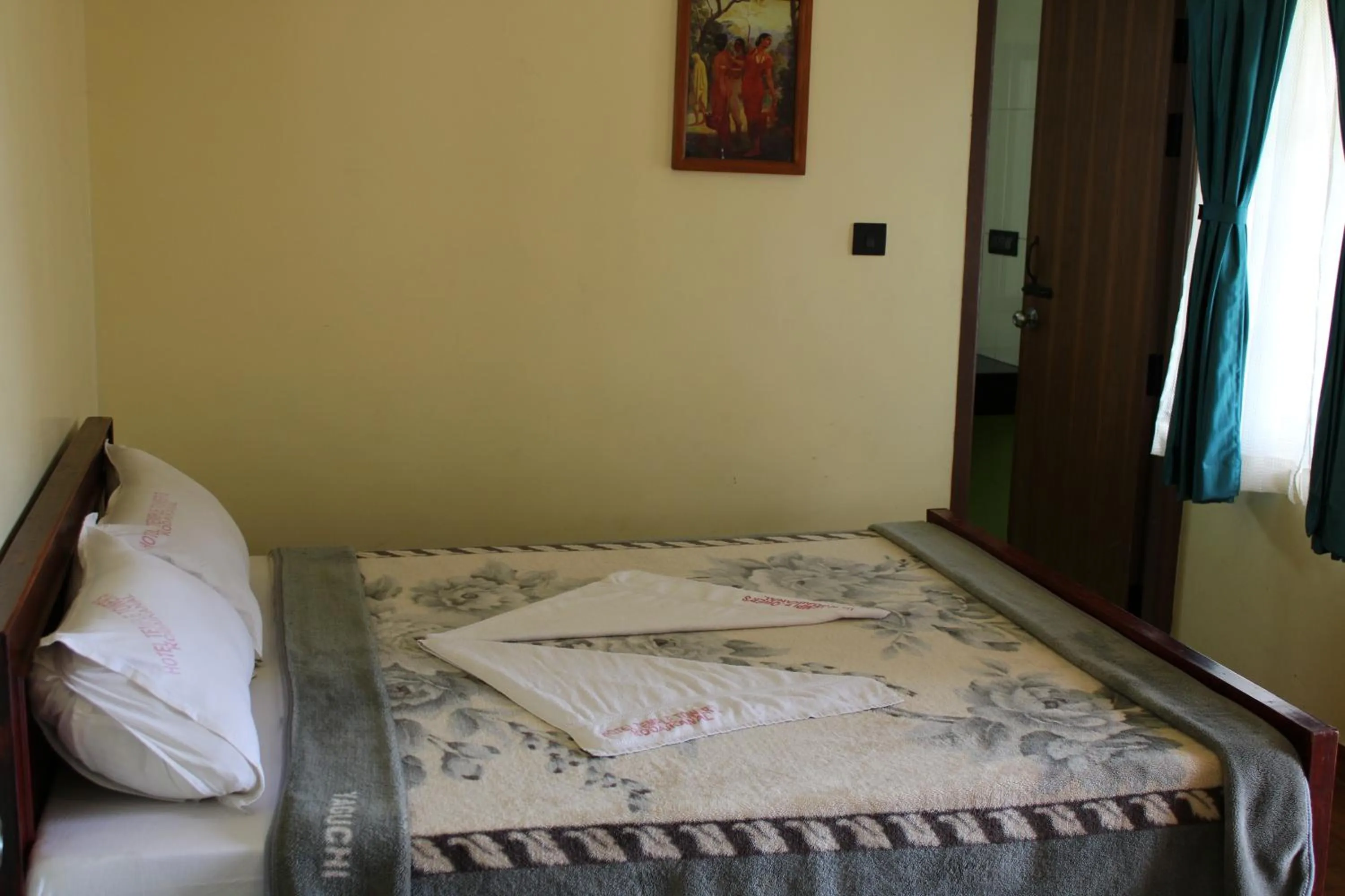 Bed in Hotel Temple Towers