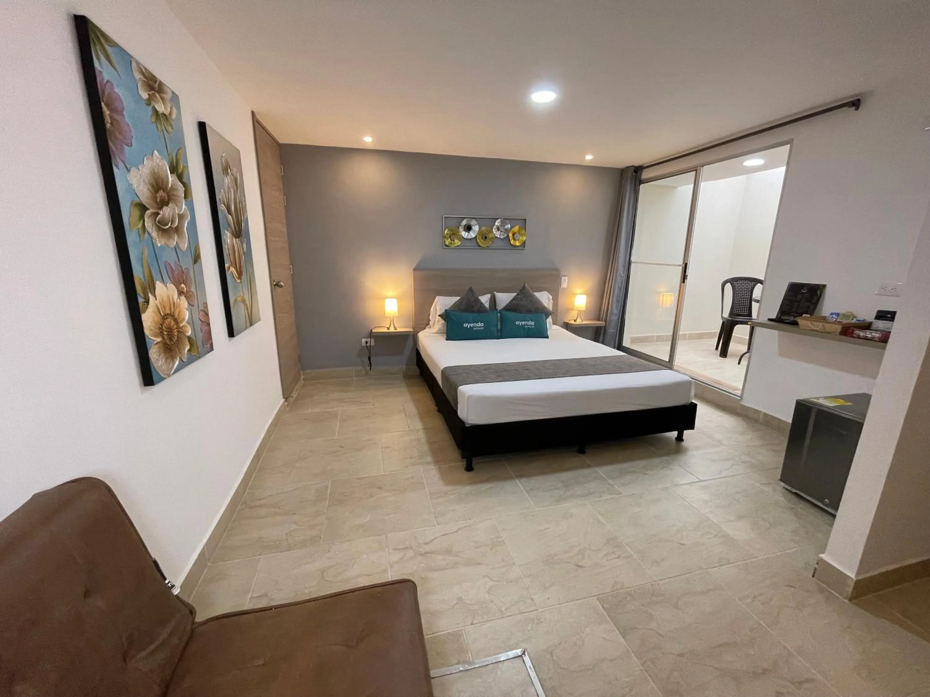 Patio, Bed in Hotel 12 Nights