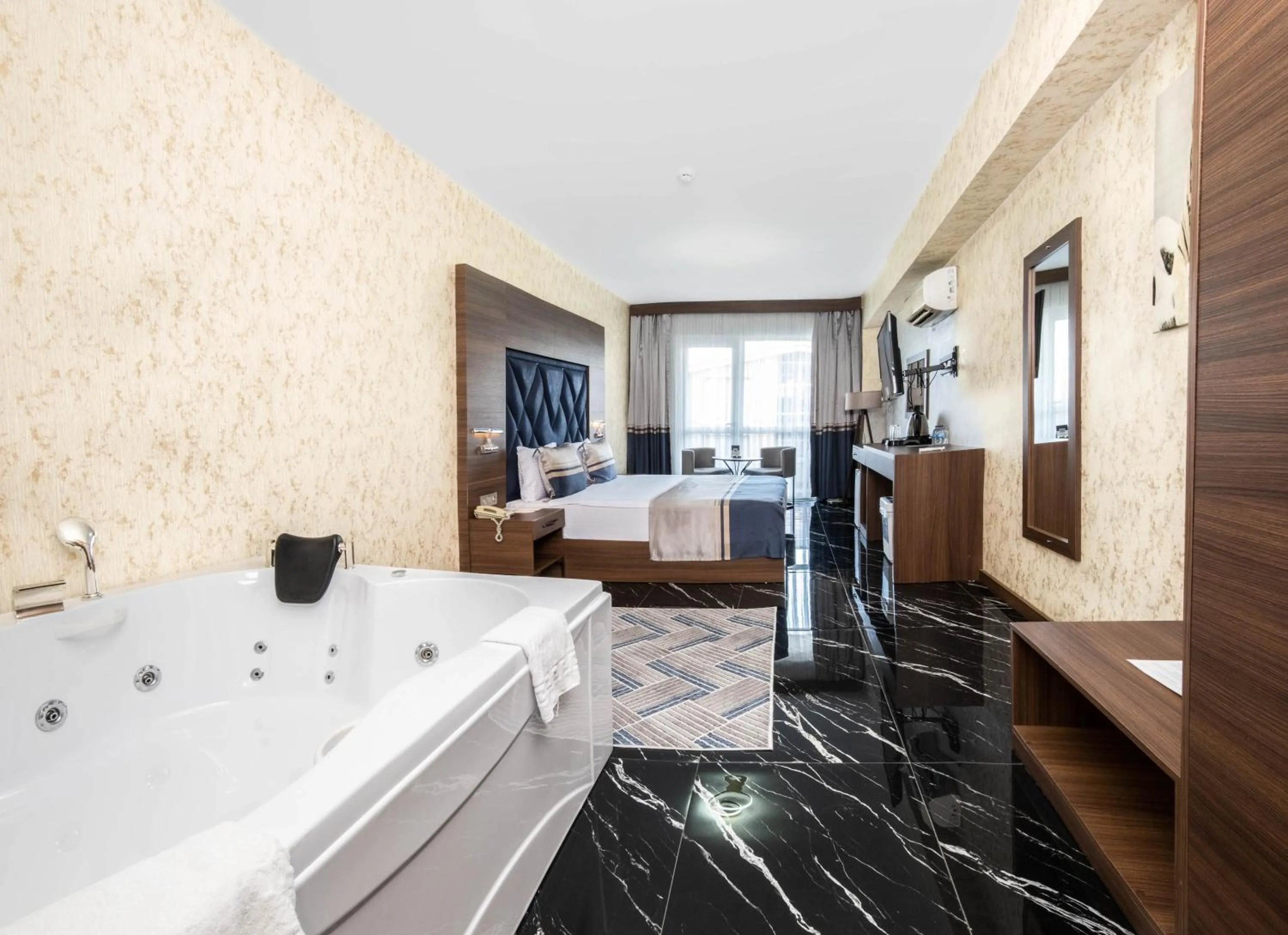 Bed in Velmore Hotel & Spa