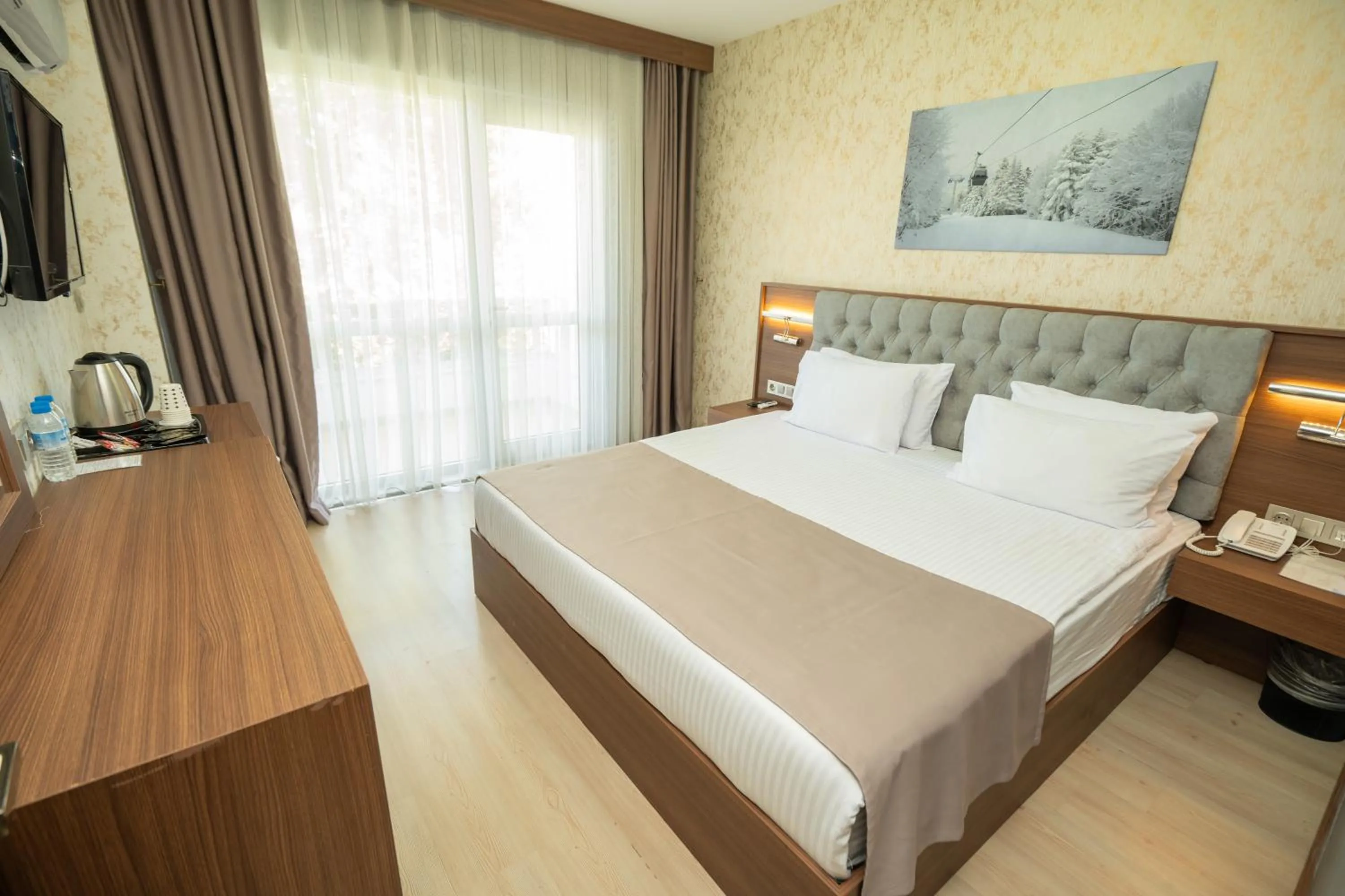 Bed in Velmore Hotel & Spa