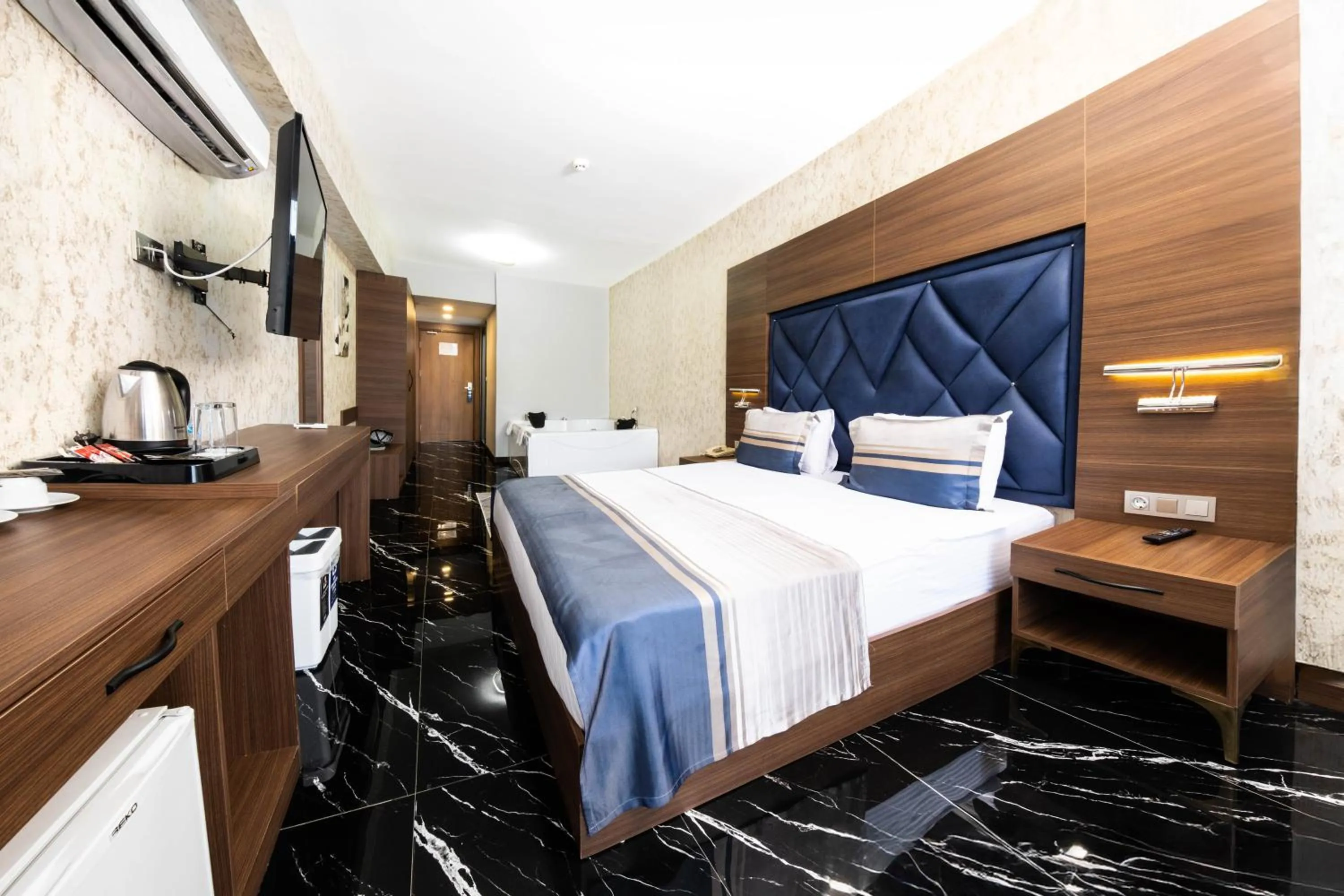 Bed in Velmore Hotel & Spa