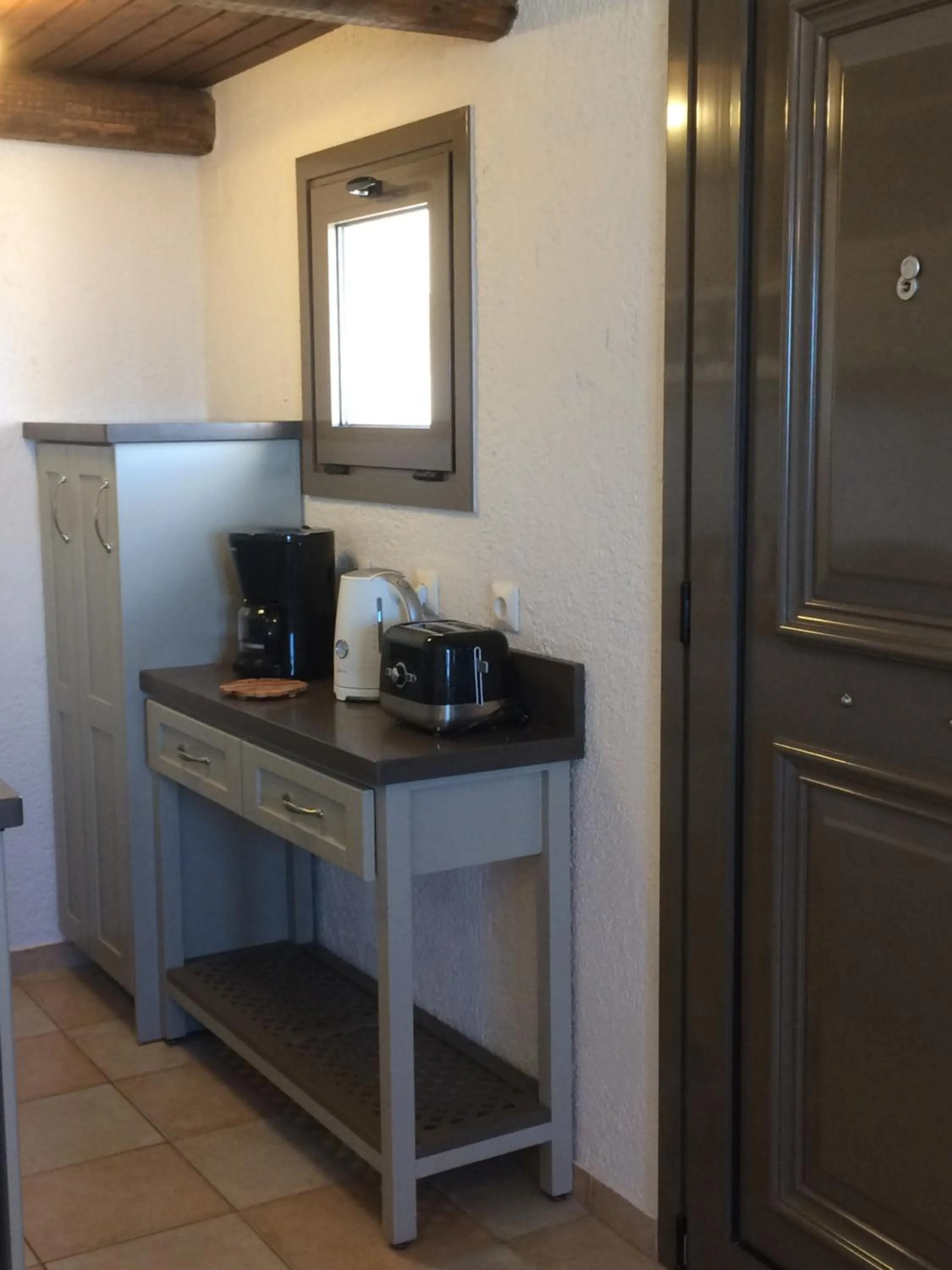 Kitchen or kitchenette in Porto Sisi Hotel Apartments