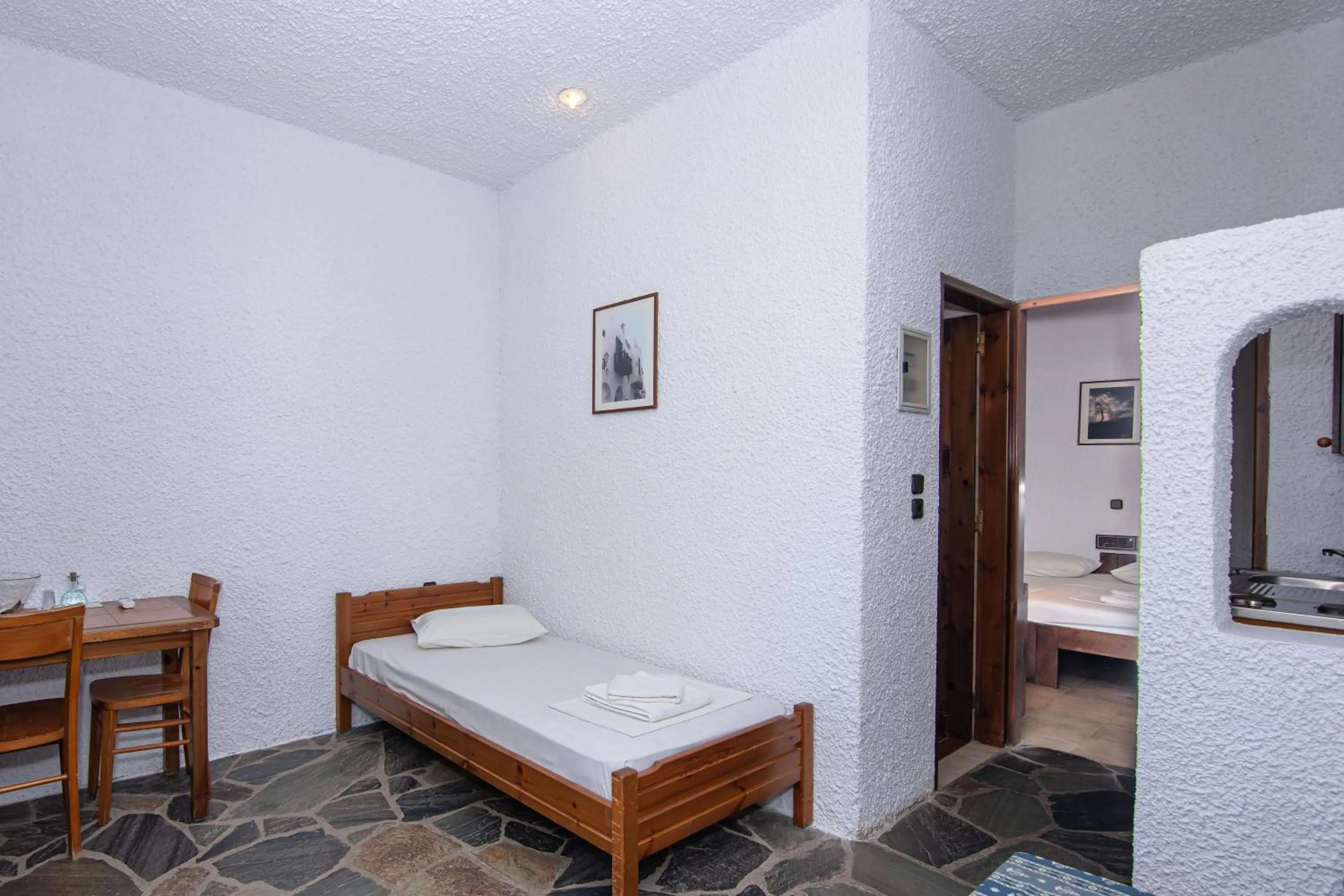 Seating area, Bed in Delfini Apartments