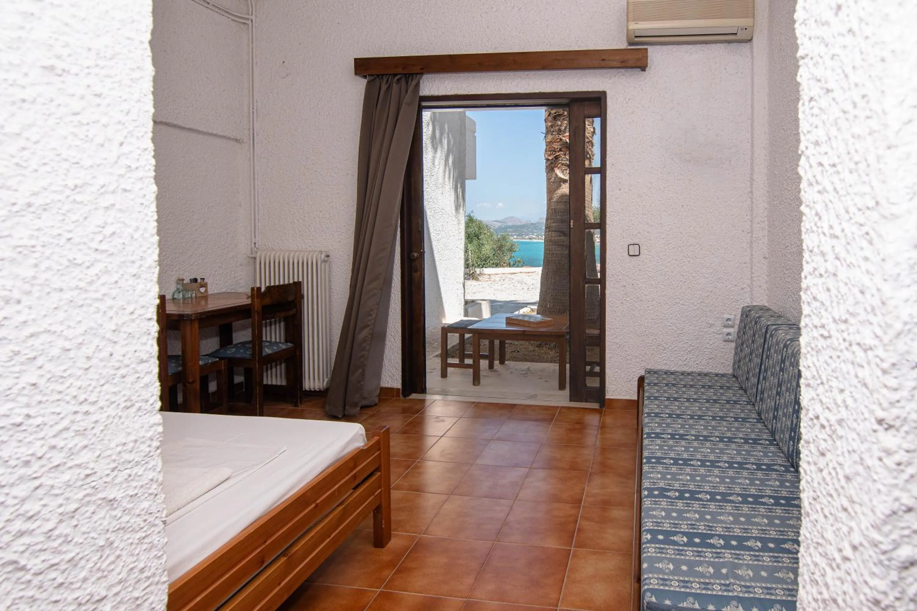 Seating area in Delfini Apartments