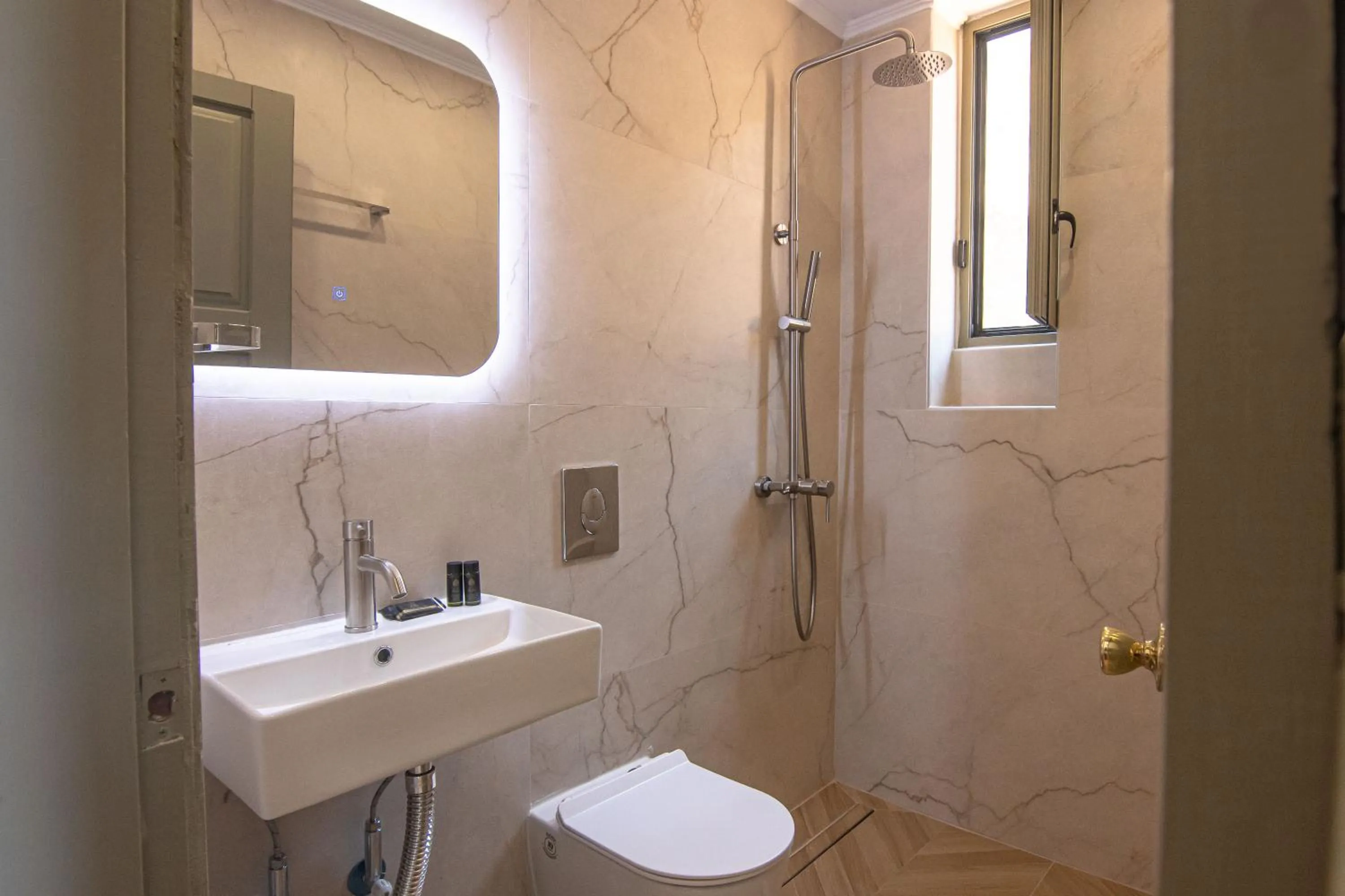 Bathroom in Delfini Apartments