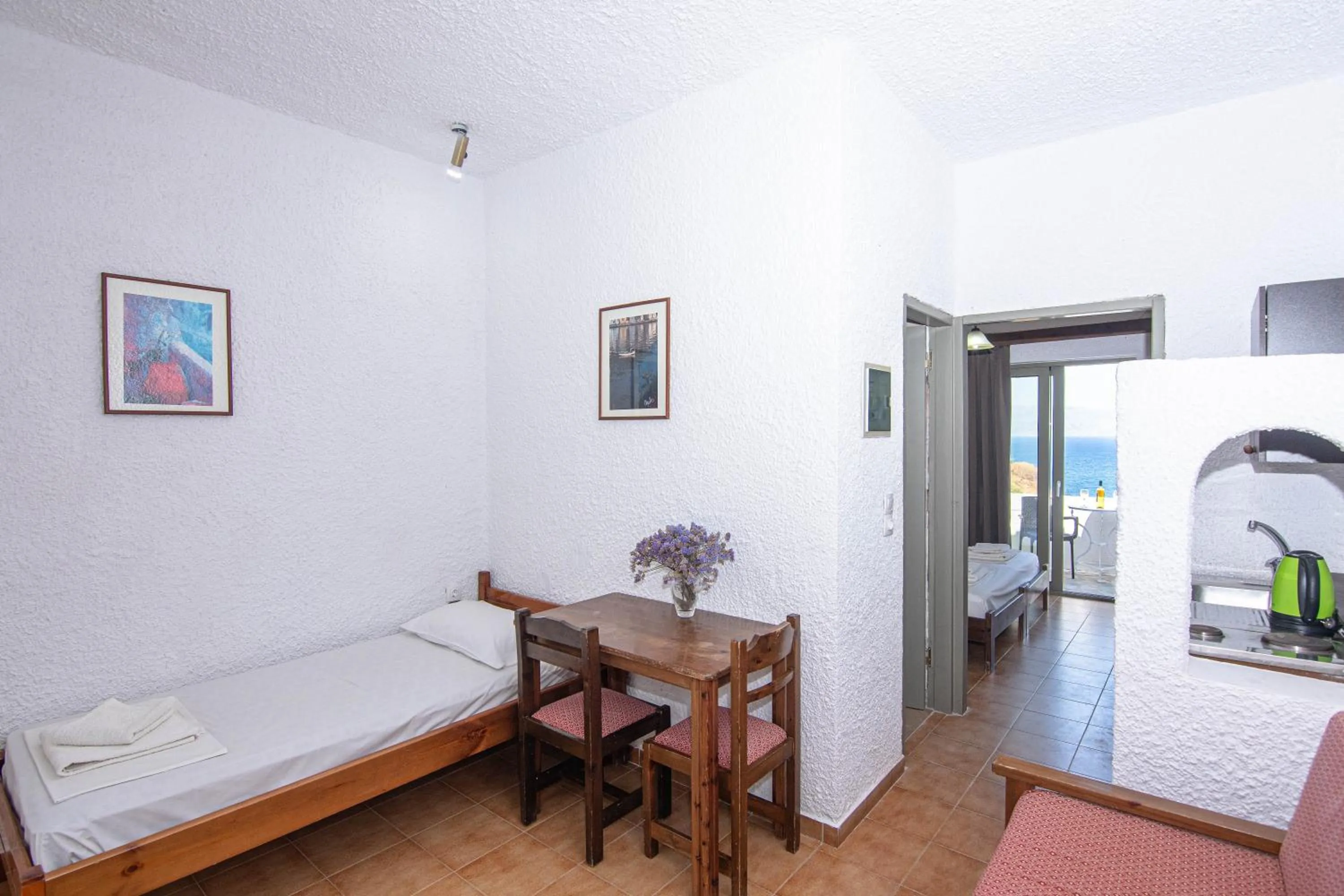 Seating area, Bed in Delfini Apartments