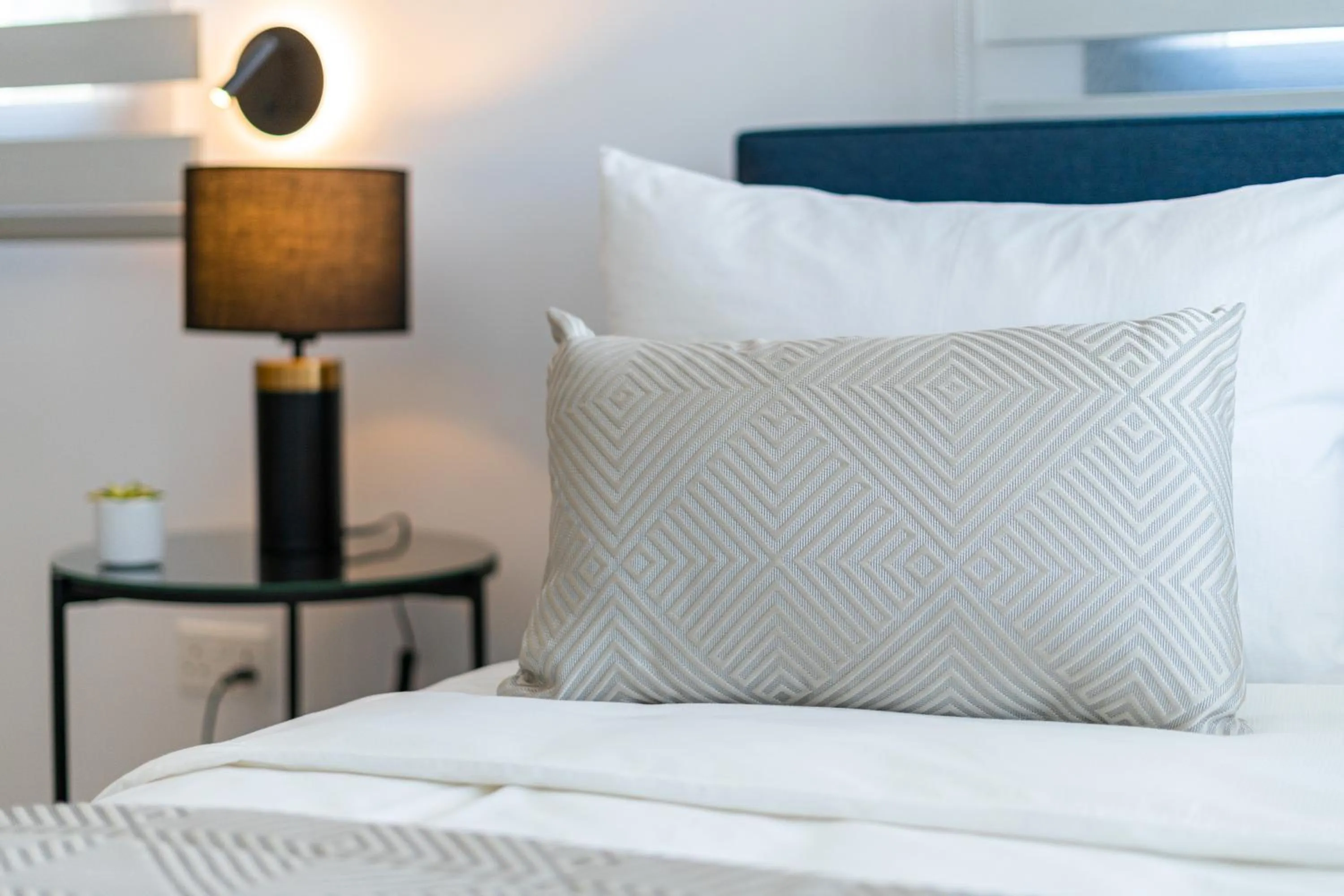 Bed in Waterside Sea View Apartments