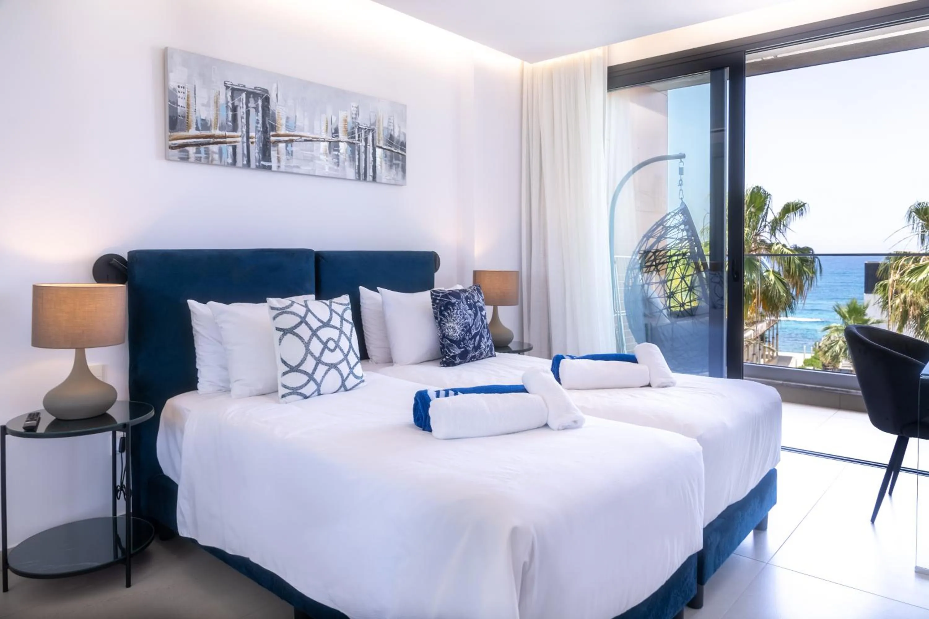 Bed in Waterside Sea View Apartments