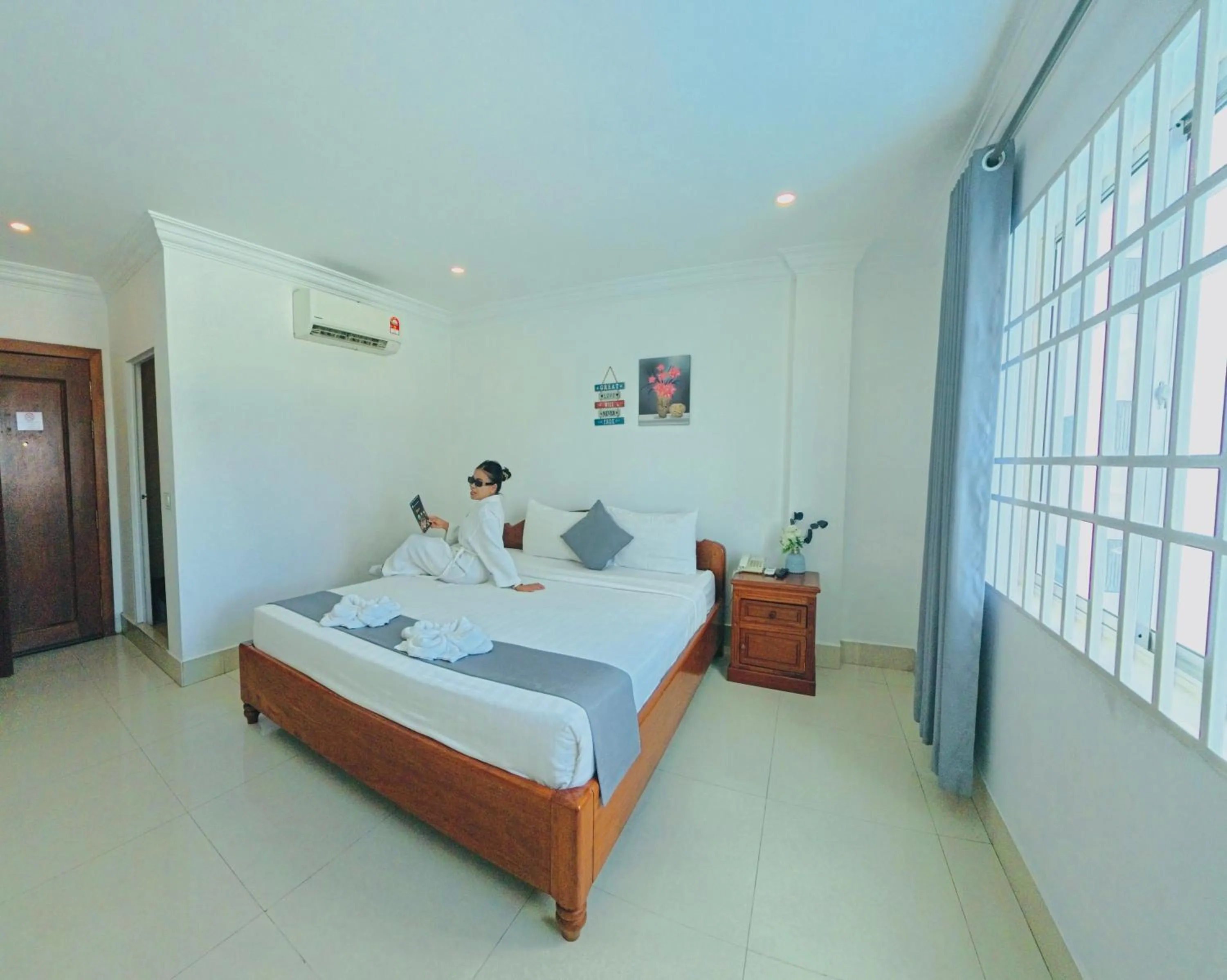 Bed in White Corner Hotel