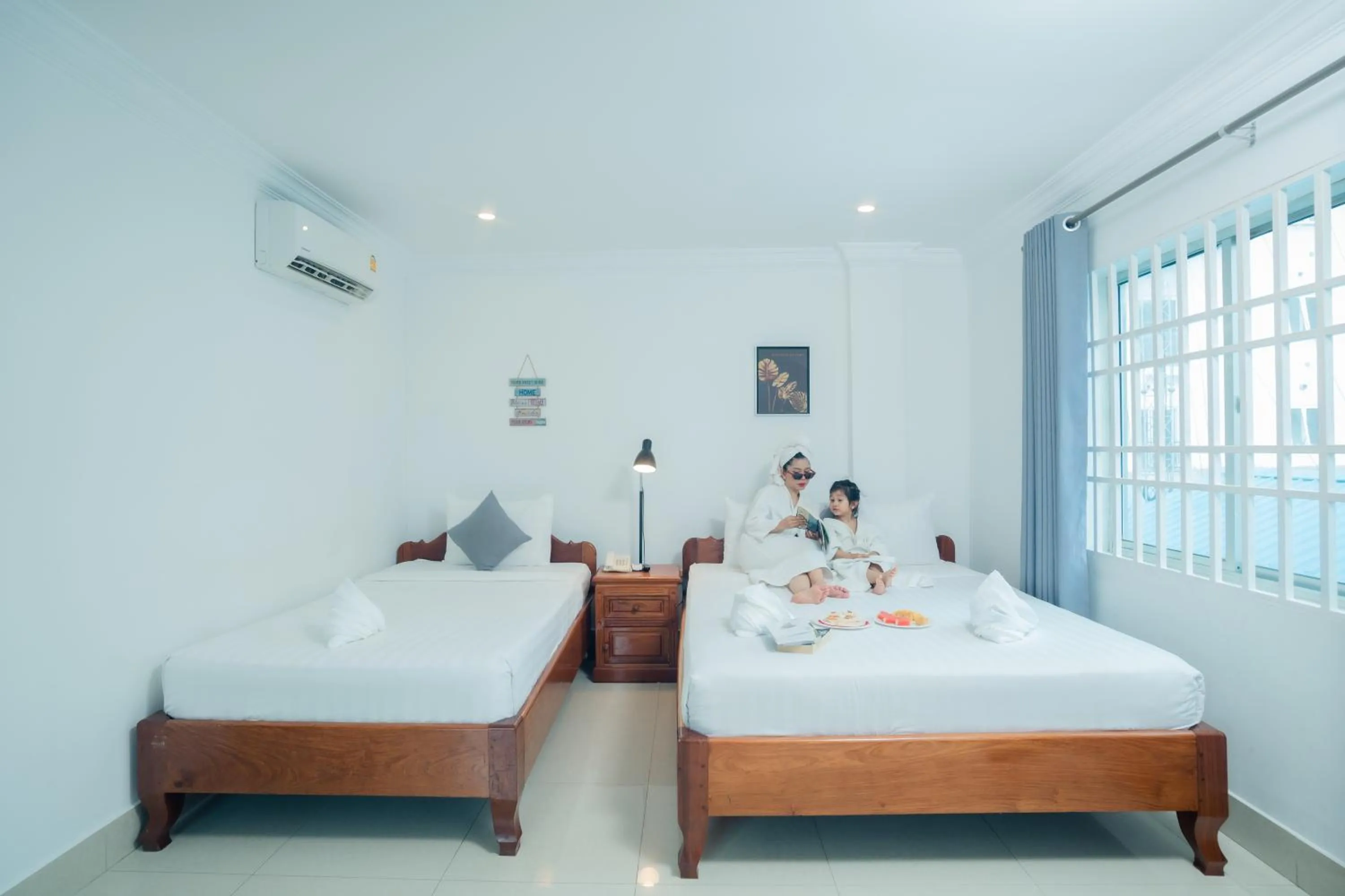 People, Bed in White Corner Hotel