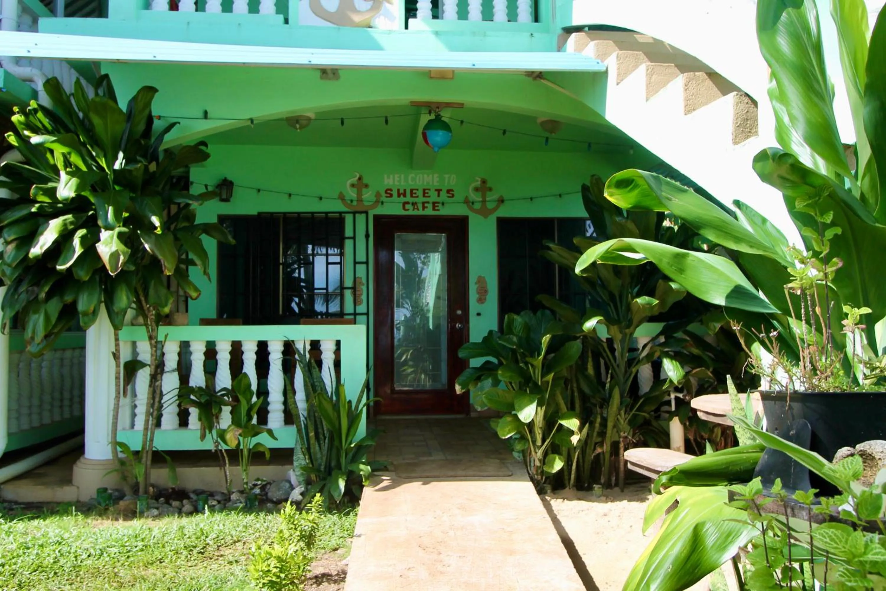 Property building in Hospedaje Rosa Del Mar & Sweets Cafe