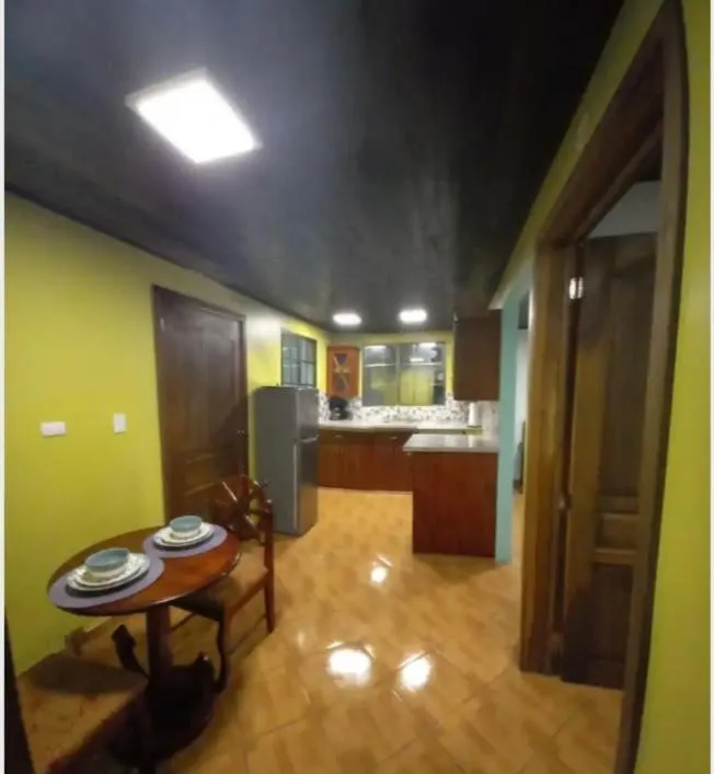 Kitchen or kitchenette in Hospedaje Rosa Del Mar & Sweets Cafe