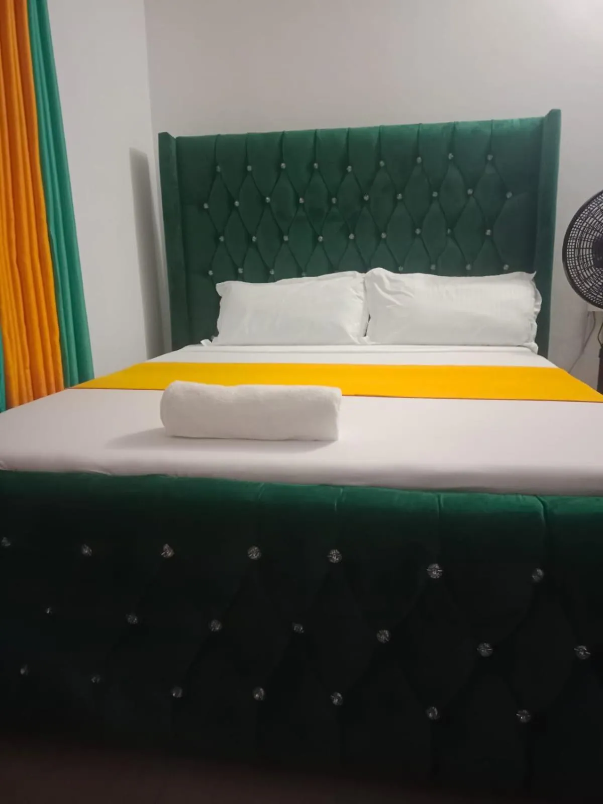 Bed in Royal Studio Apartment