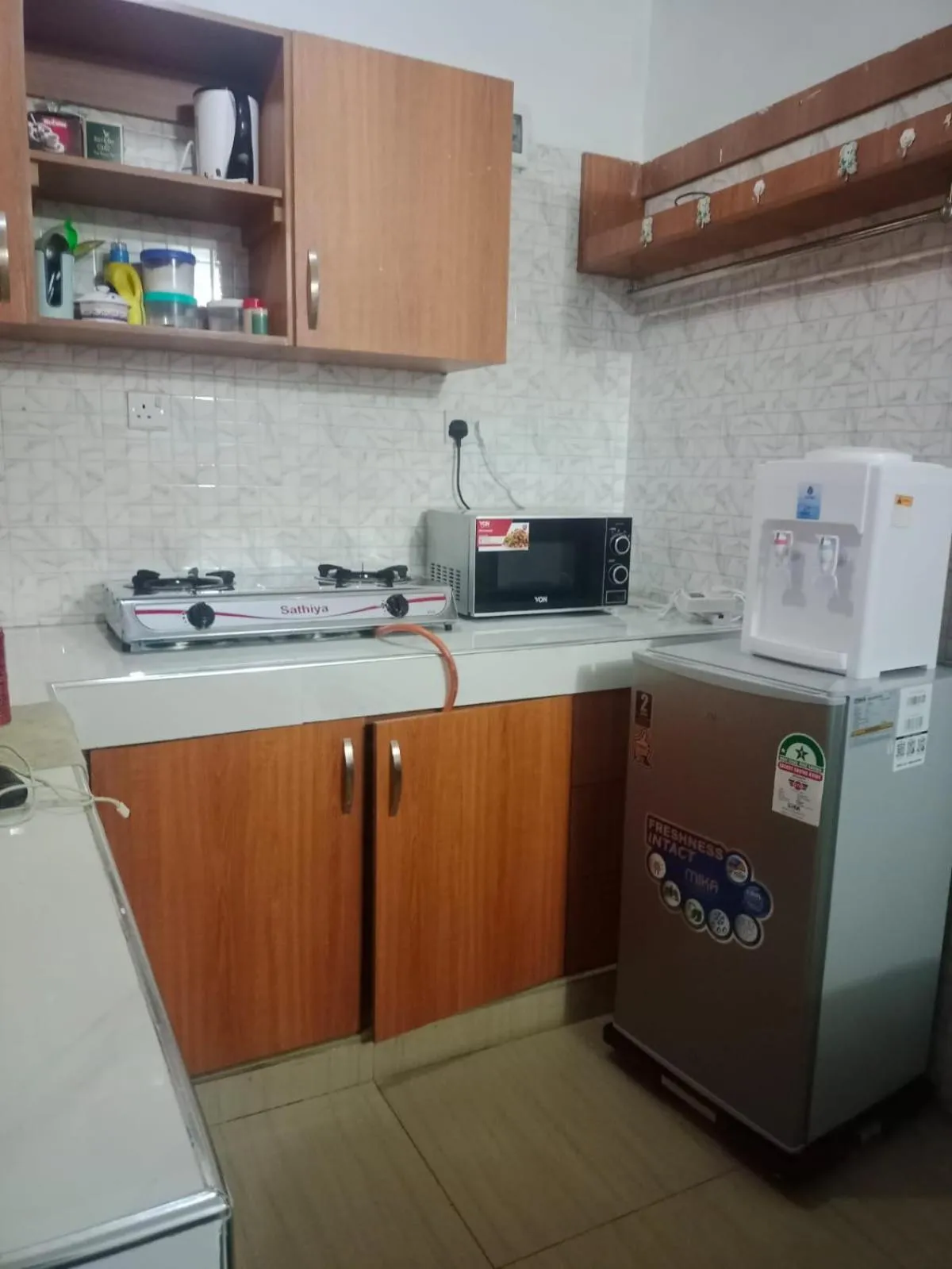 Kitchen or kitchenette in Royal Studio Apartment