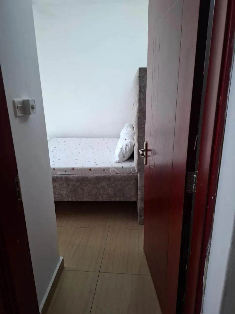 Bed in Royal Studio Apartment