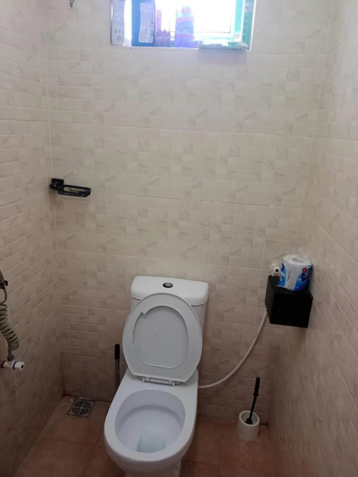 Toilet in Royal Studio Apartment
