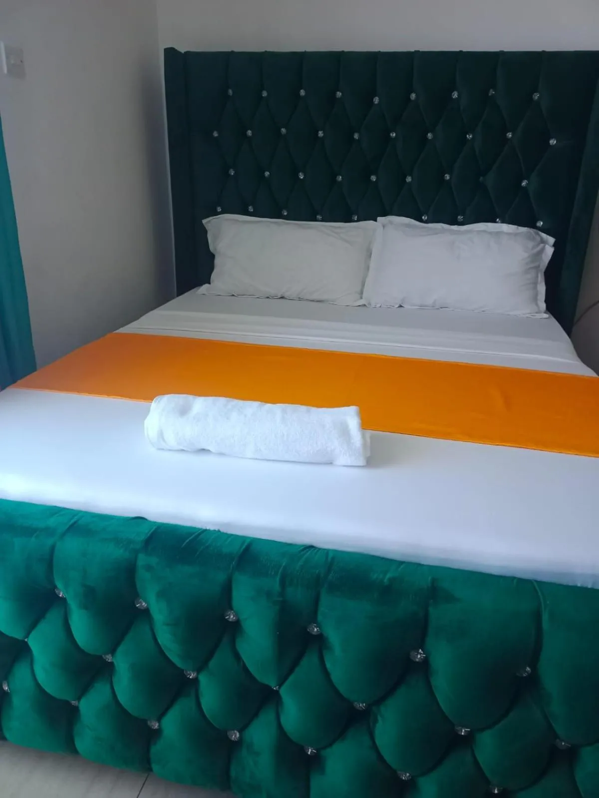 Bed in Royal Studio Apartment