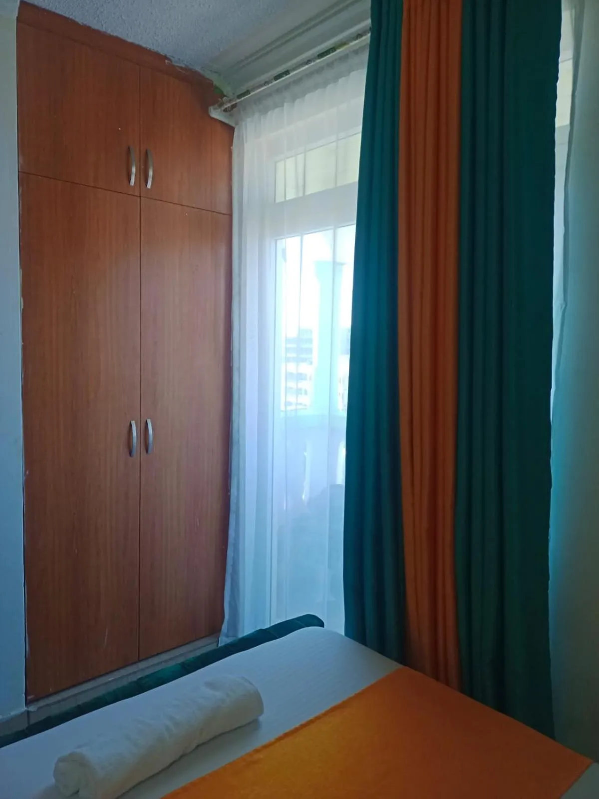 Bed in Royal Studio Apartment