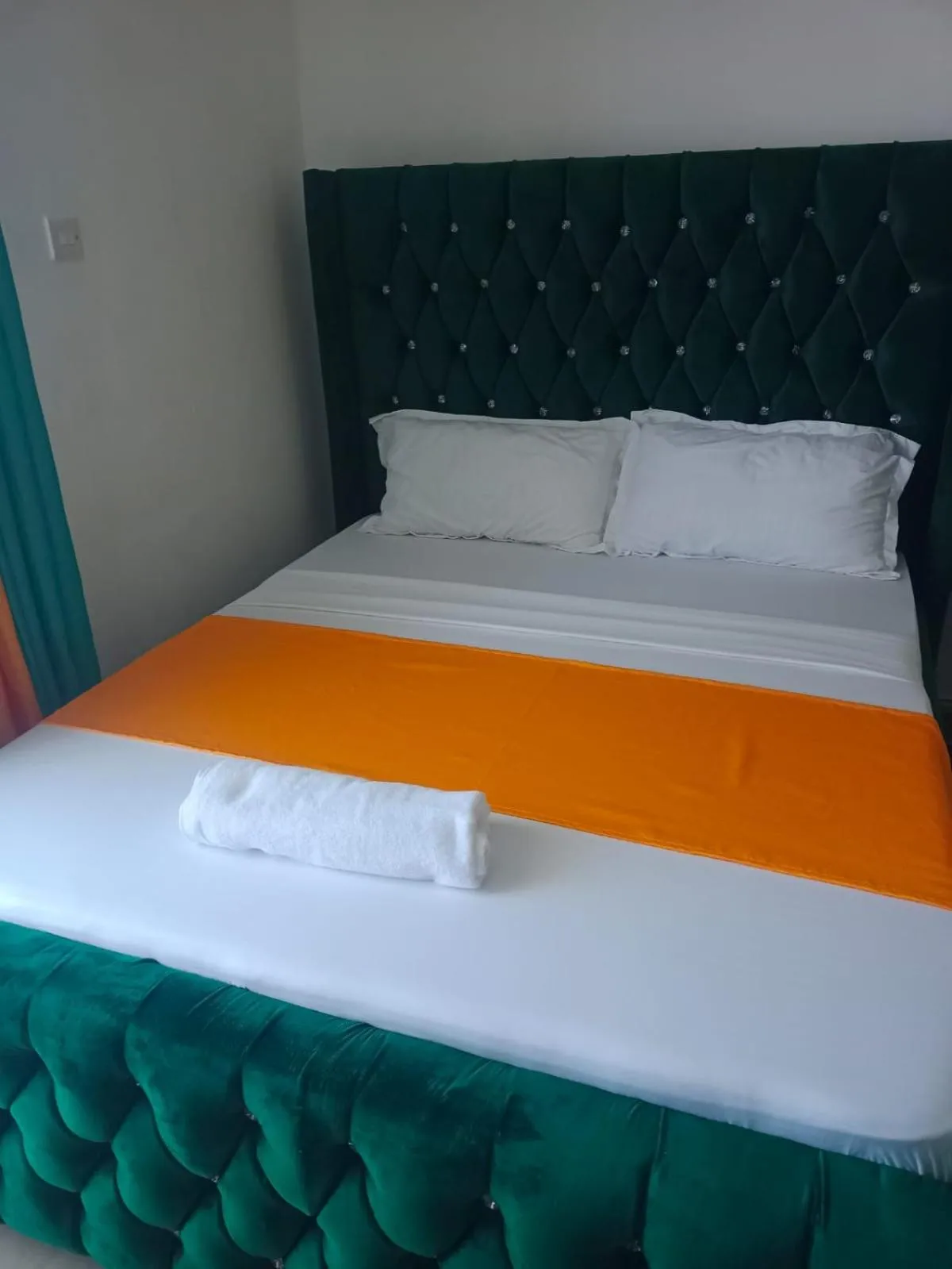Bed in Royal Studio Apartment