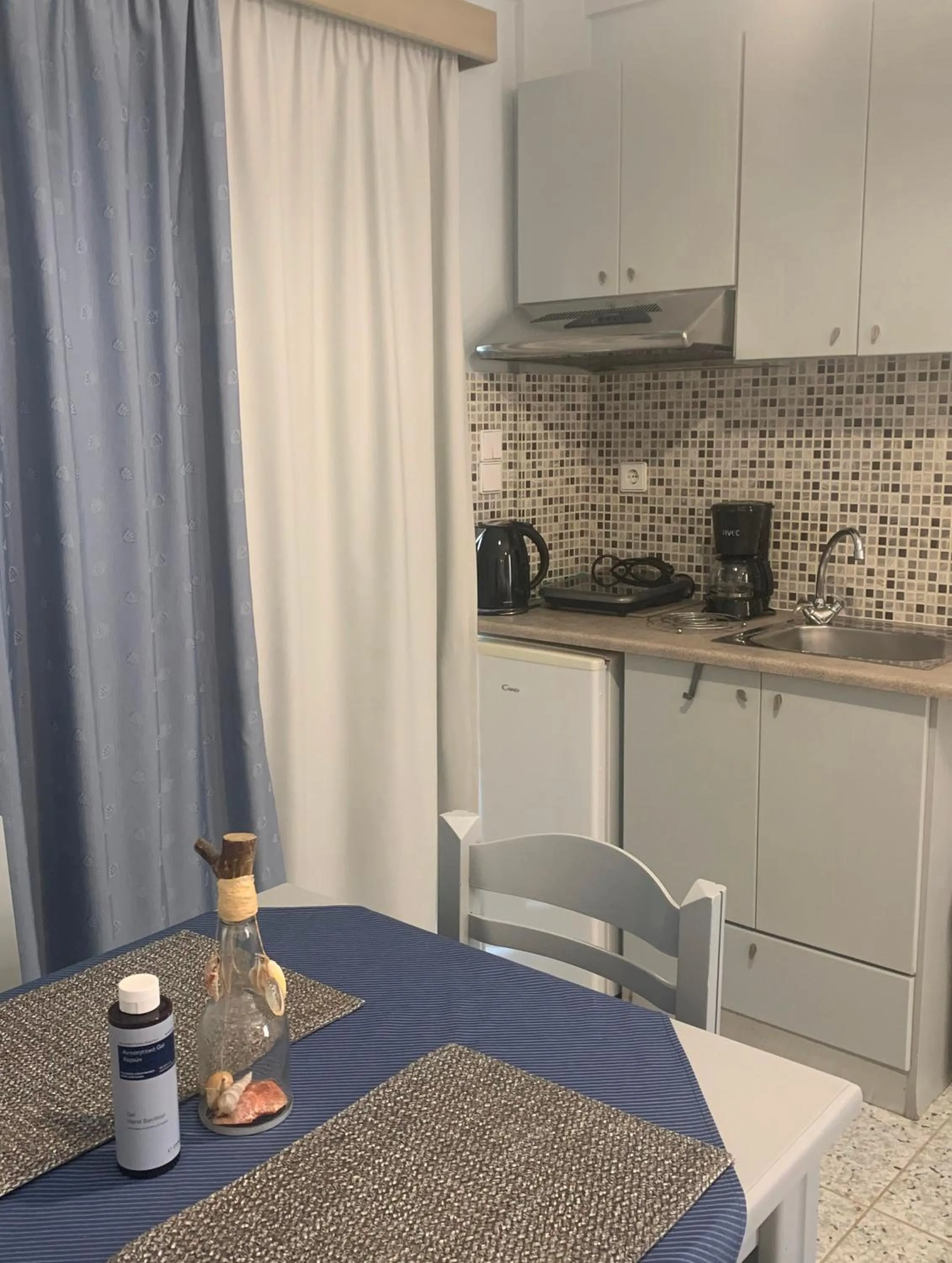 Kitchen or kitchenette in Ermis Suites