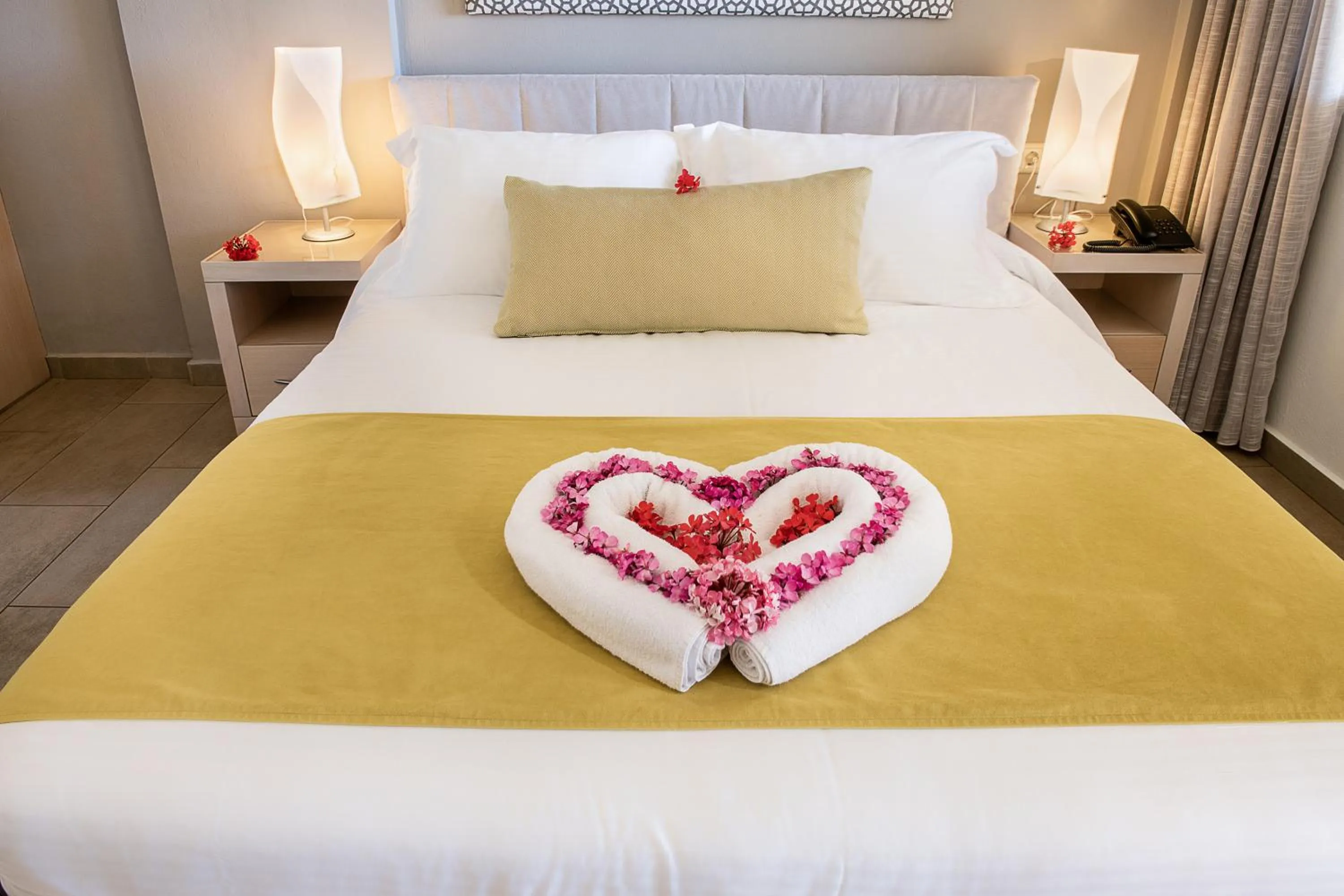 Bed in Kavos Hotel & Suites