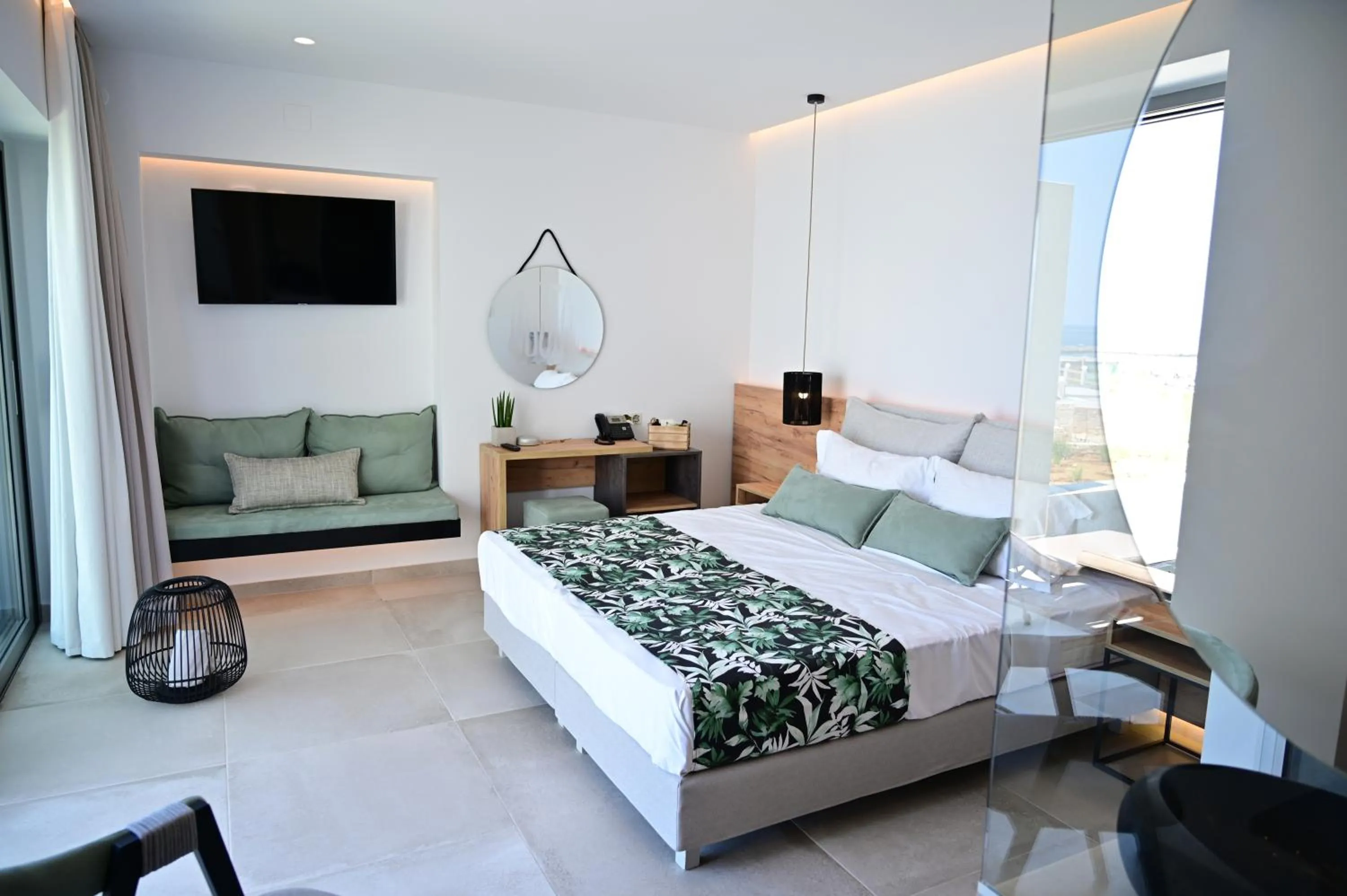 Bed in Kavos Hotel & Suites