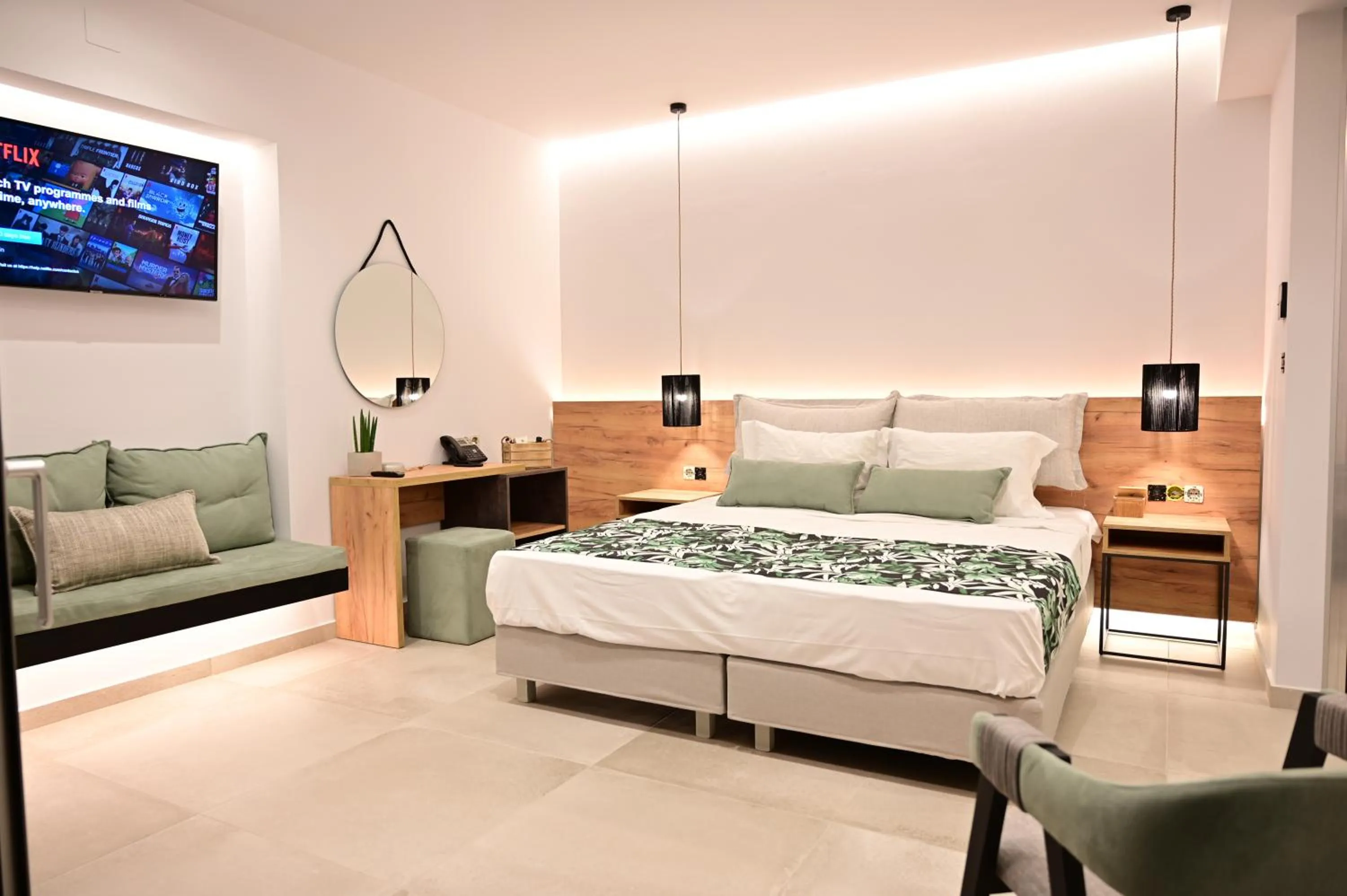 Bed in Kavos Hotel & Suites