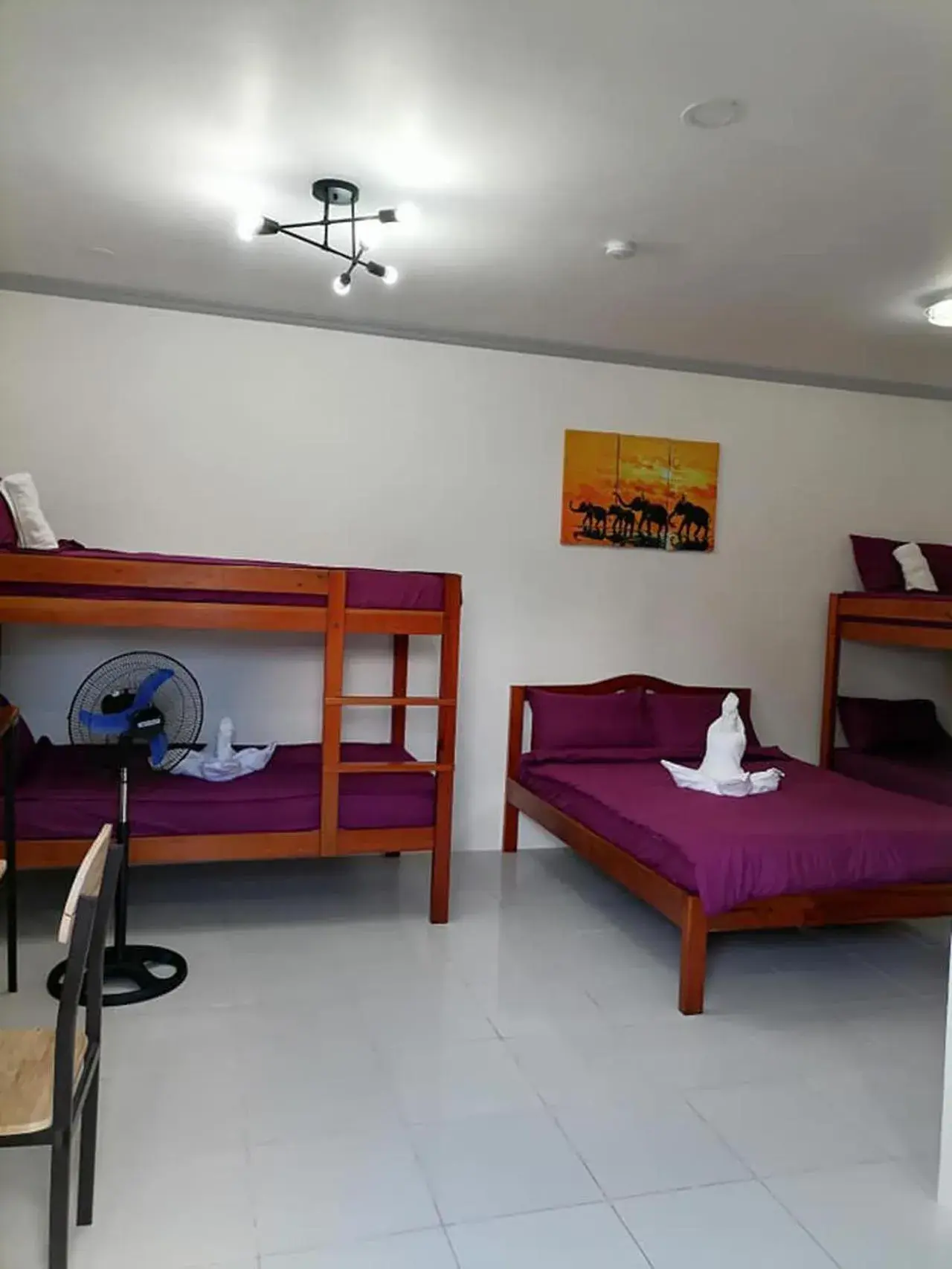 Bed in La Bella Swiss Inn Bed in La Bella Swiss Inn