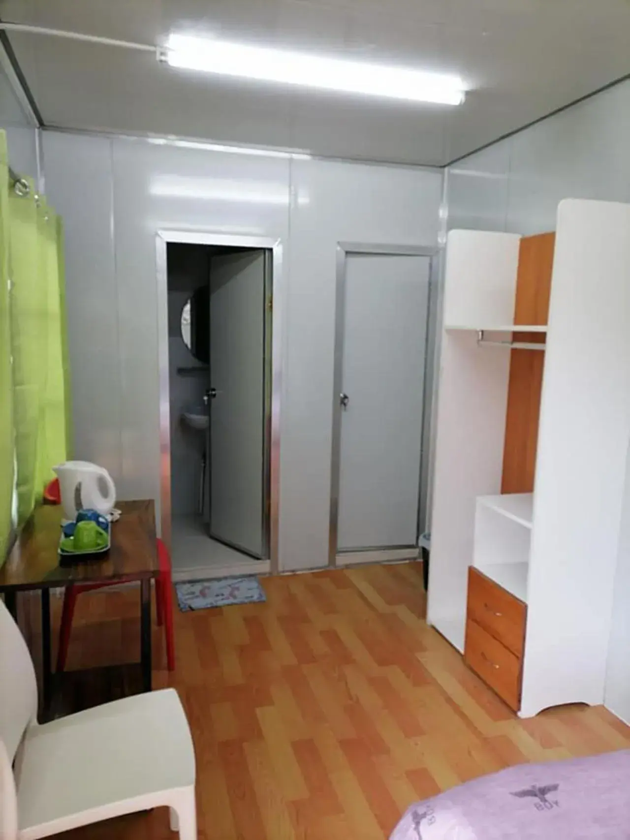 wardrobe, Bed in La Bella Swiss Inn wardrobe, Bed in La Bella Swiss Inn