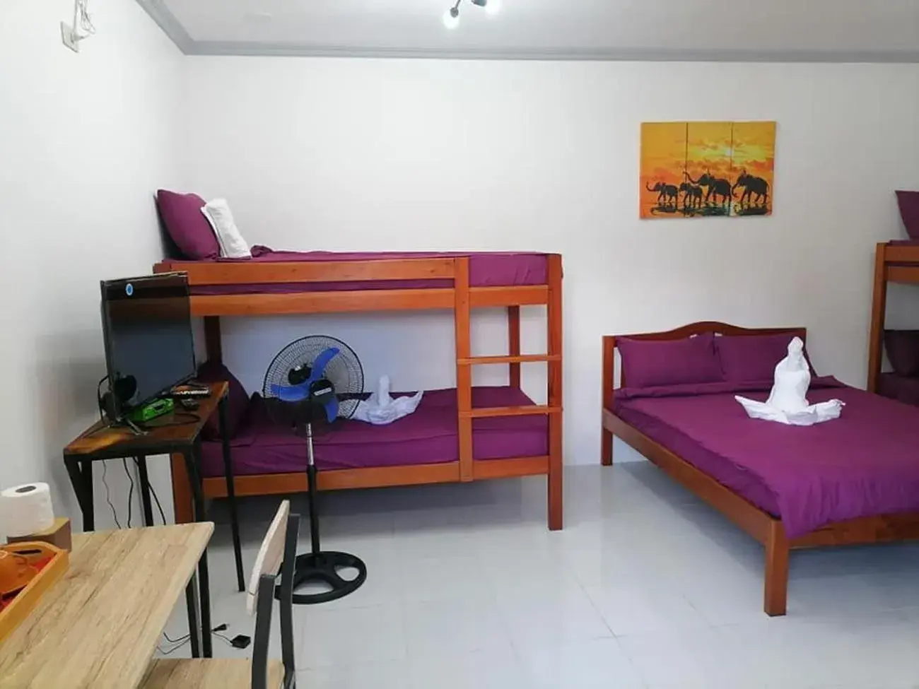 Bed in La Bella Swiss Inn Bed in La Bella Swiss Inn