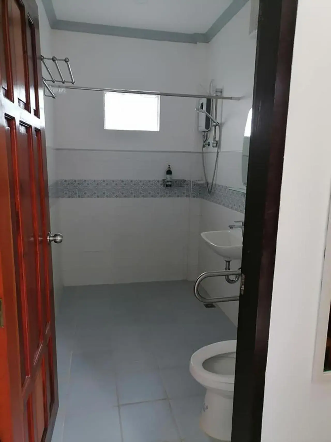 Bathroom in La Bella Swiss Inn Bathroom in La Bella Swiss Inn